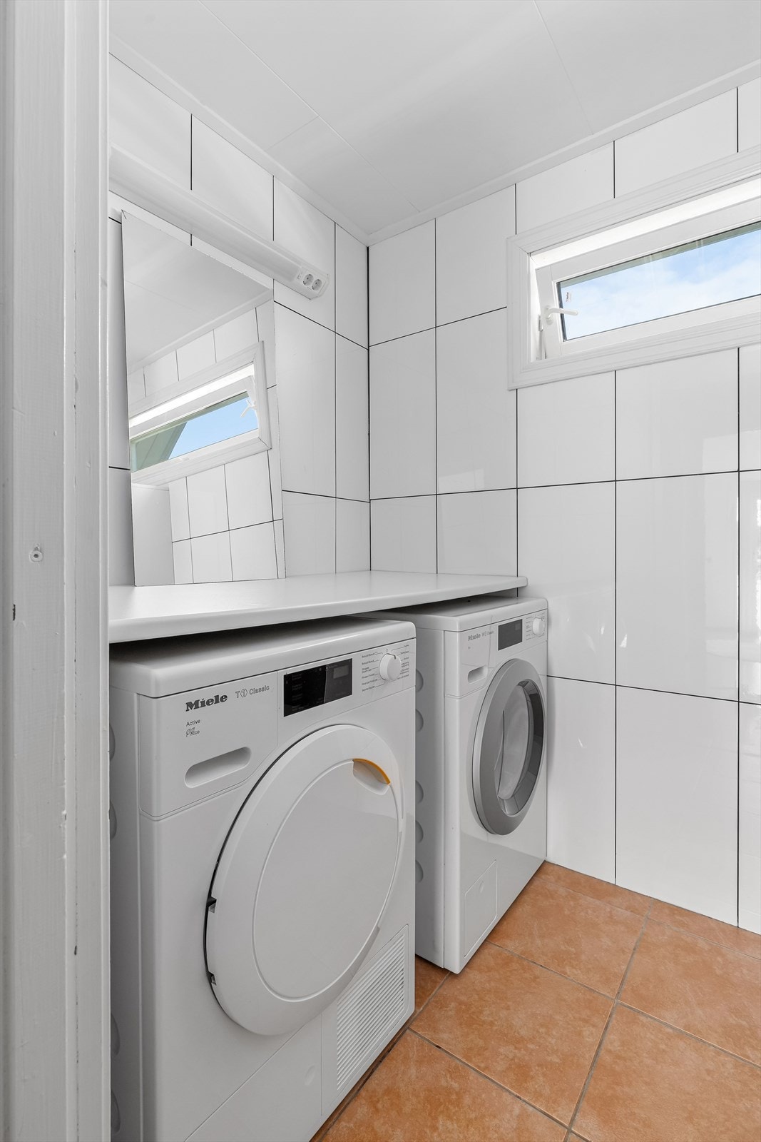 Badet har opplegg for vaskemaskin og tørketrommel Galleribilde