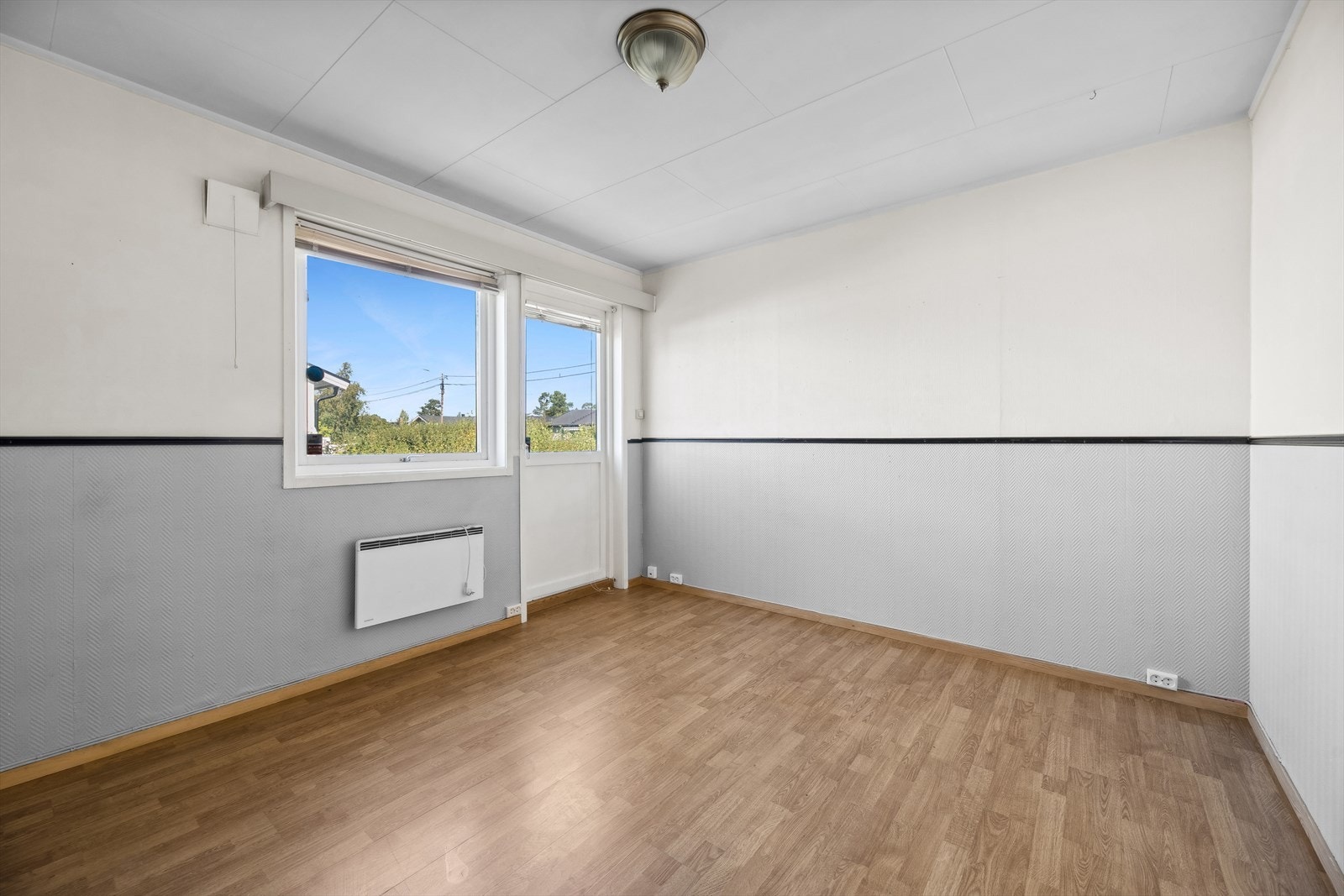 Her får du plass til en sofagruppe og tilhørende møbler. Galleribilde