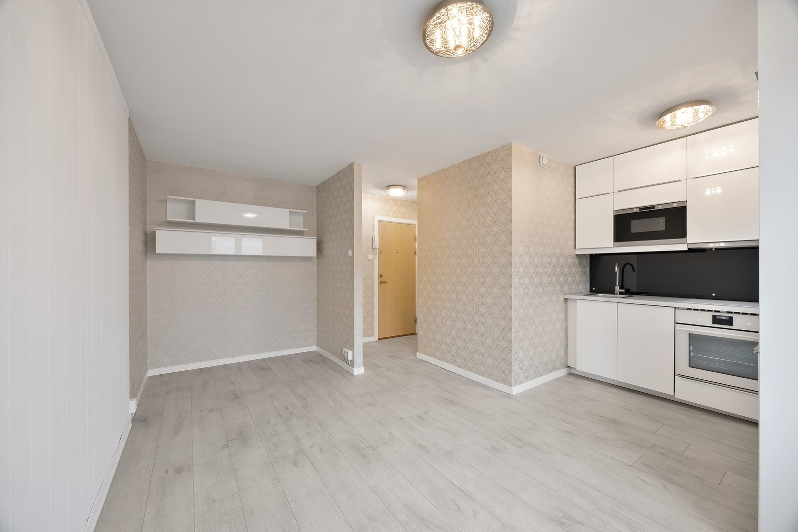 Arealsmart leilighet med stue og kjøkken i åpen løsning Galleribilde