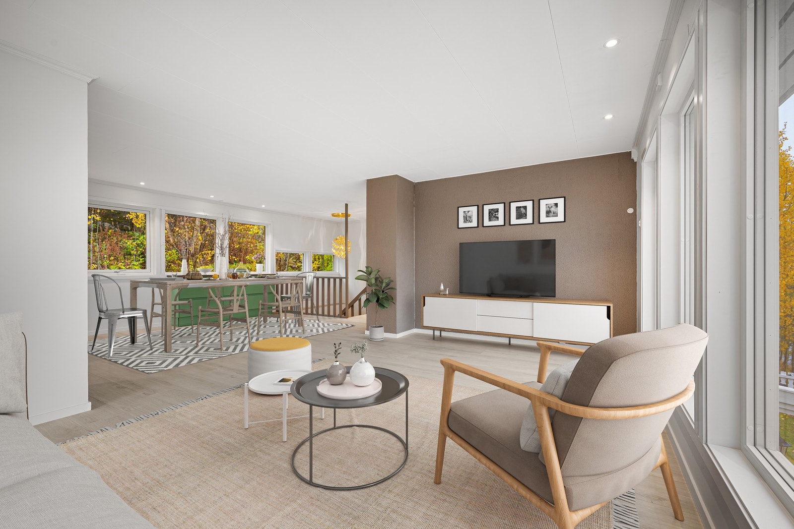 Stuen er inndelt i to soner hvor det er naturlig med innredning av sofagruppe og spisestue Galleribilde