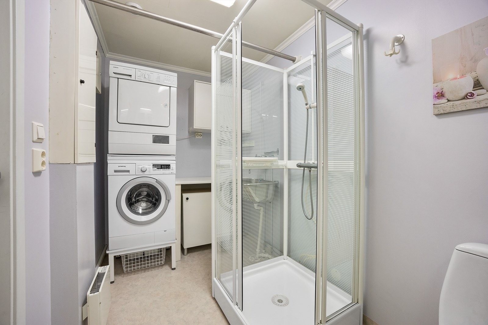Badet har opplegg til vaskemaskin og tørketrommel Galleribilde