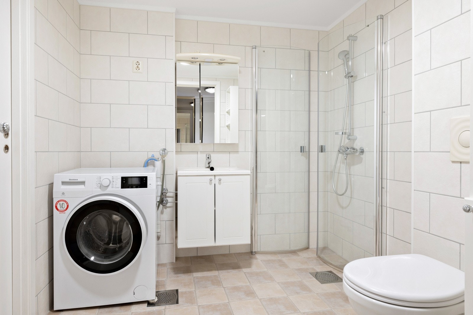 Flislagt bad med varme i gulv. Galleribilde