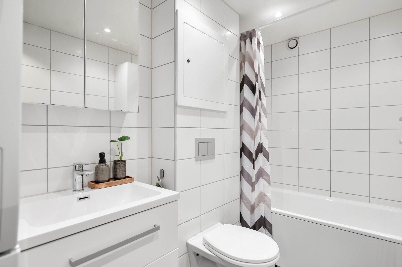 Pent flislagt baderom pusset opp i regi av borettslaget i 2018. Galleribilde