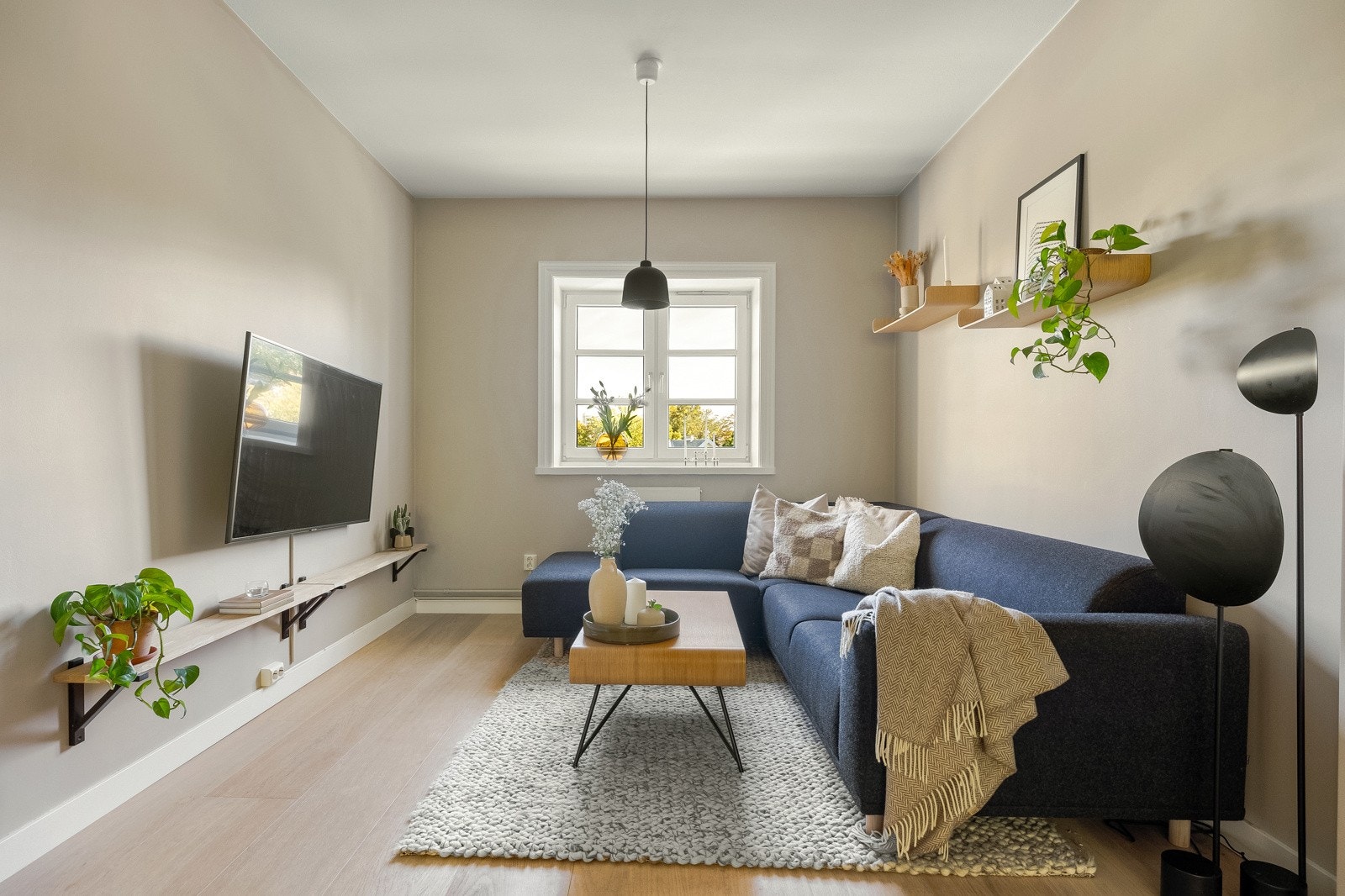 Dagens eier har åpnet opp bærekonstruksjonen og etablert dagligstue der det tidligere var soverom. Galleribilde