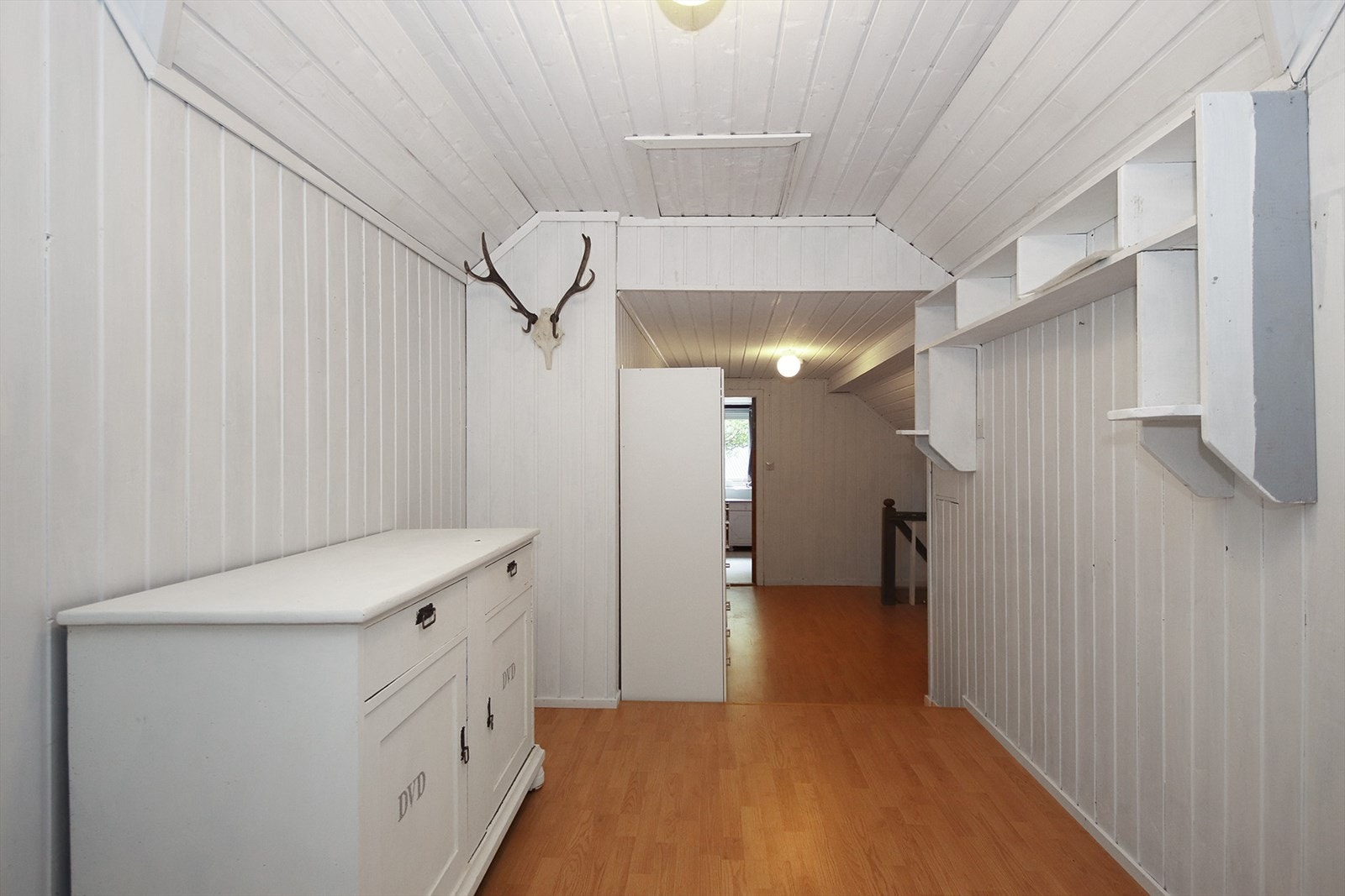 Overetasjen inneholder gang og flere soverom. Galleribilde