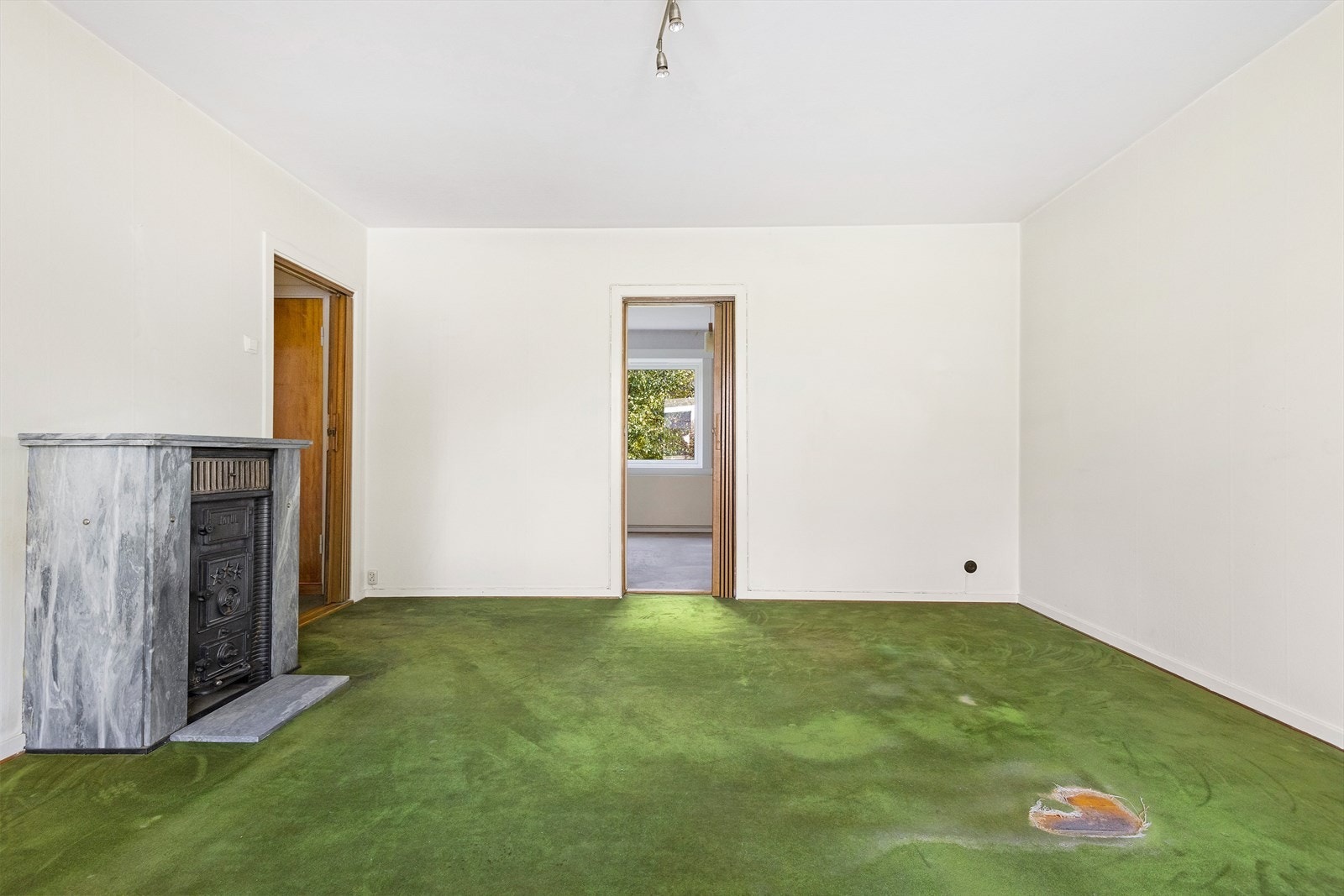 Adkomst til det største soverommet fra stuen Galleribilde