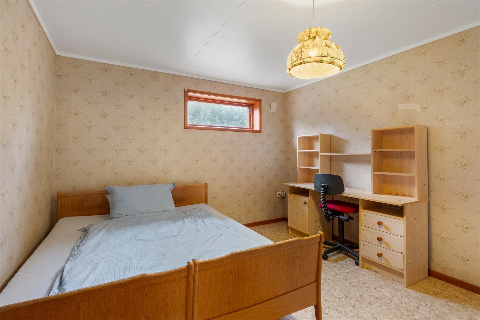Rom innredet som soverom. Opprinnelig godkjent som bodareal på byggetegninger. Galleribilde