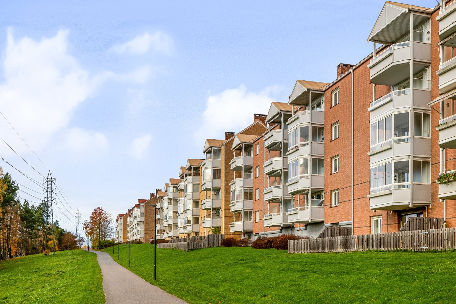 Fasade | Borettslaget består av 517 andelsleiligheter. Galleribilde