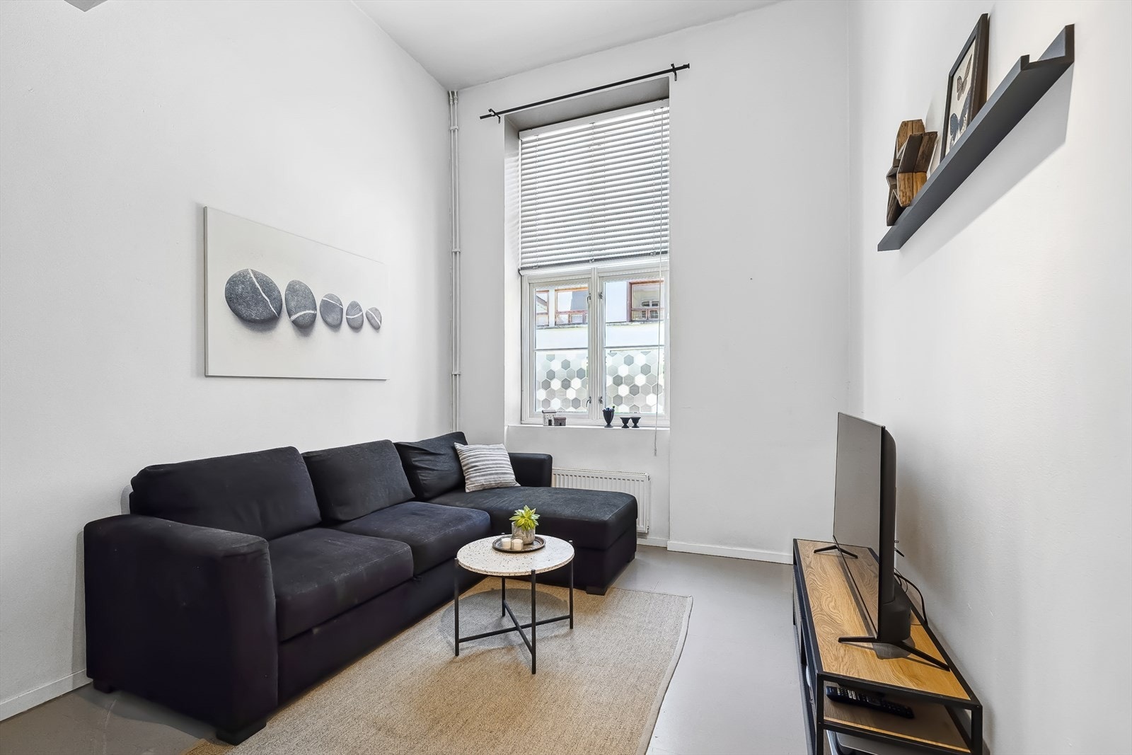 Det er flere møbleringsmuligheter i stuen. Galleribilde