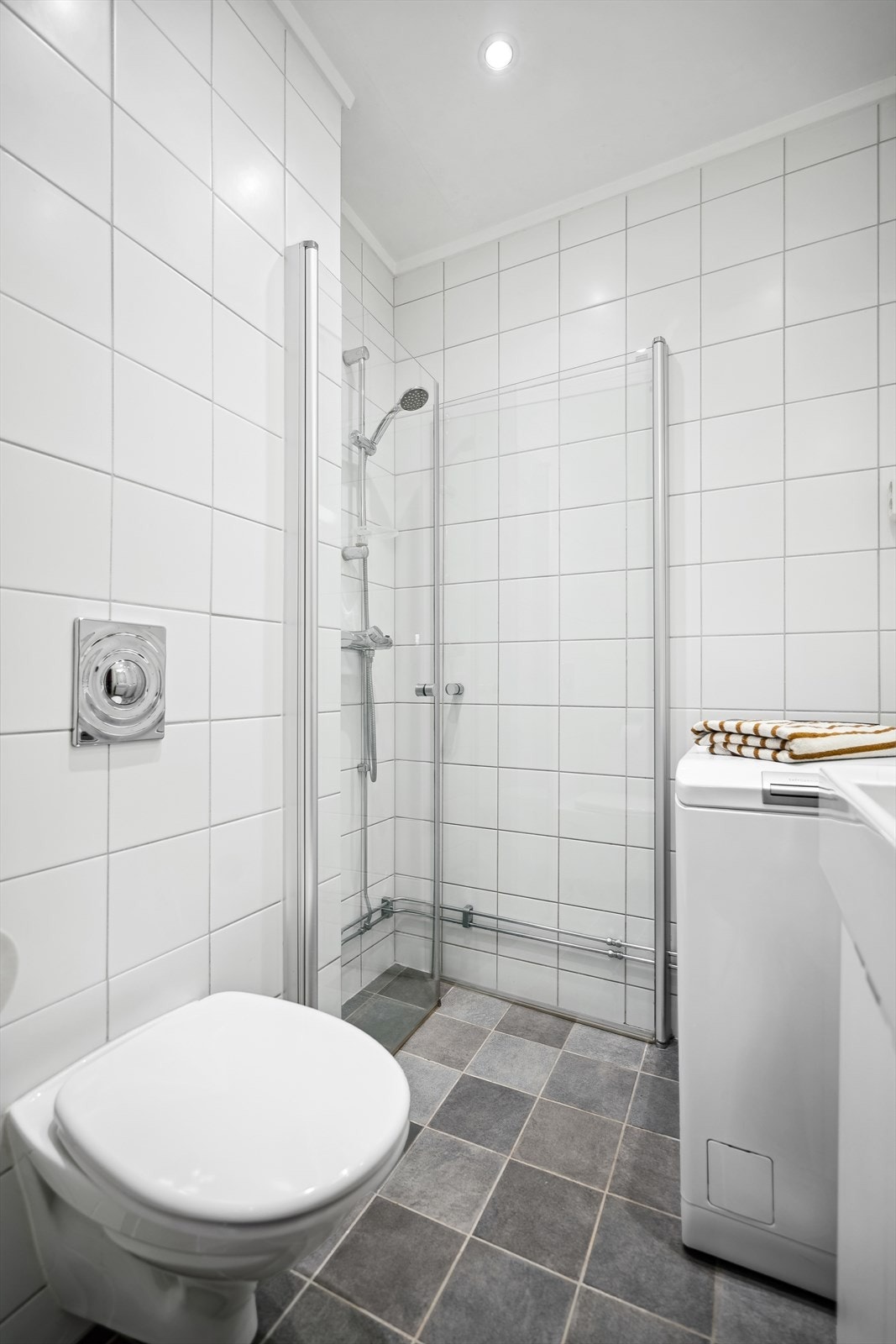 Det er plass til vaskemaskin. Galleribilde