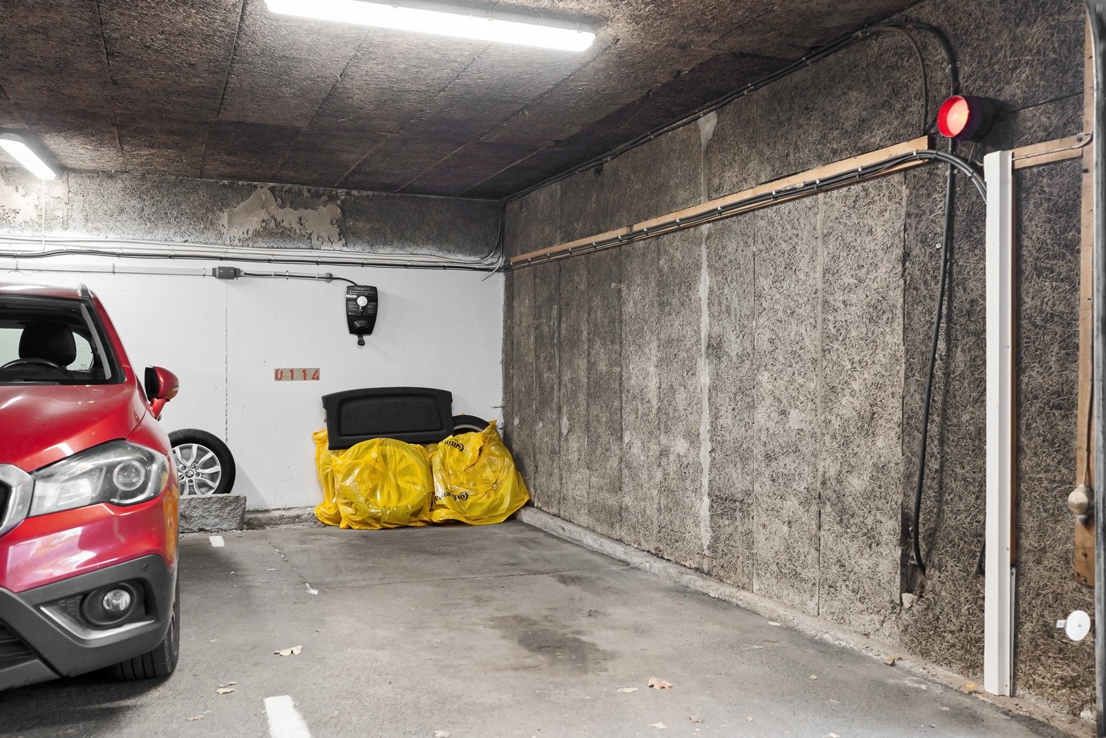 Med leiligheten følger garasjeplass med lader Galleribilde