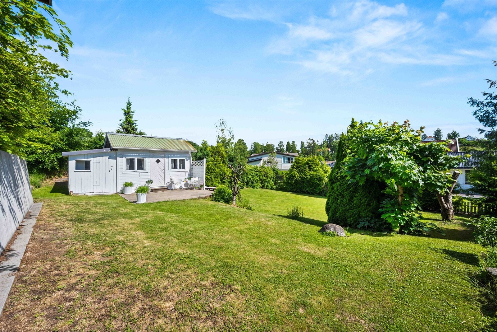 I hagen har du et hyggelig uthus Galleribilde