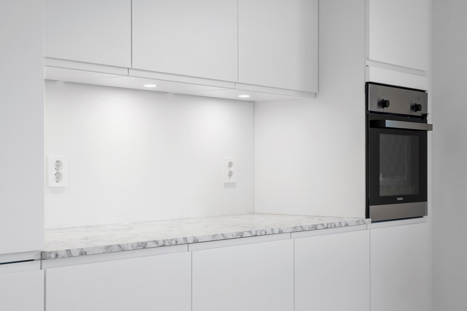 Integrert komfyr i benkehøyde Galleribilde