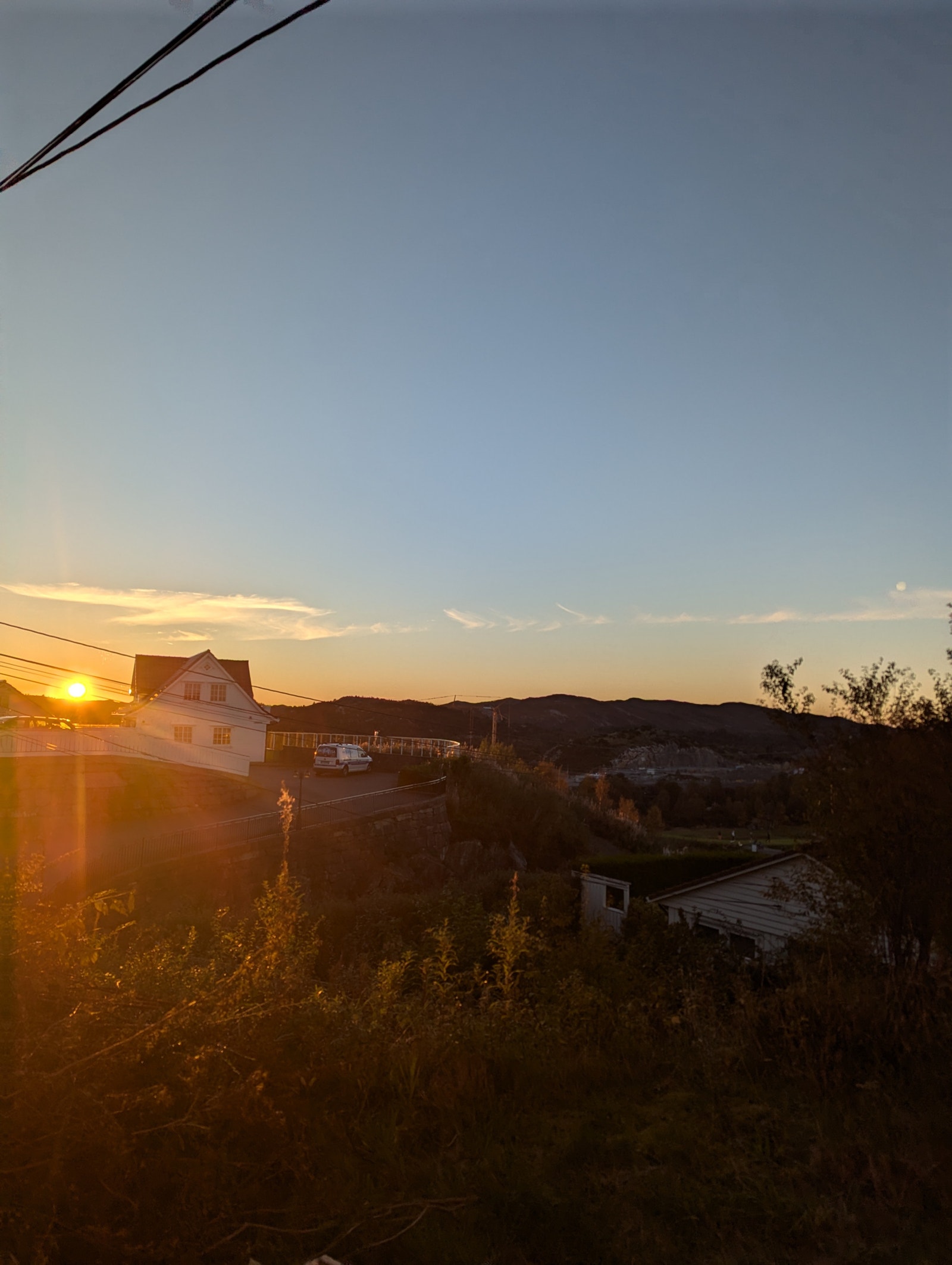 Solen som går ned i September Galleribilde