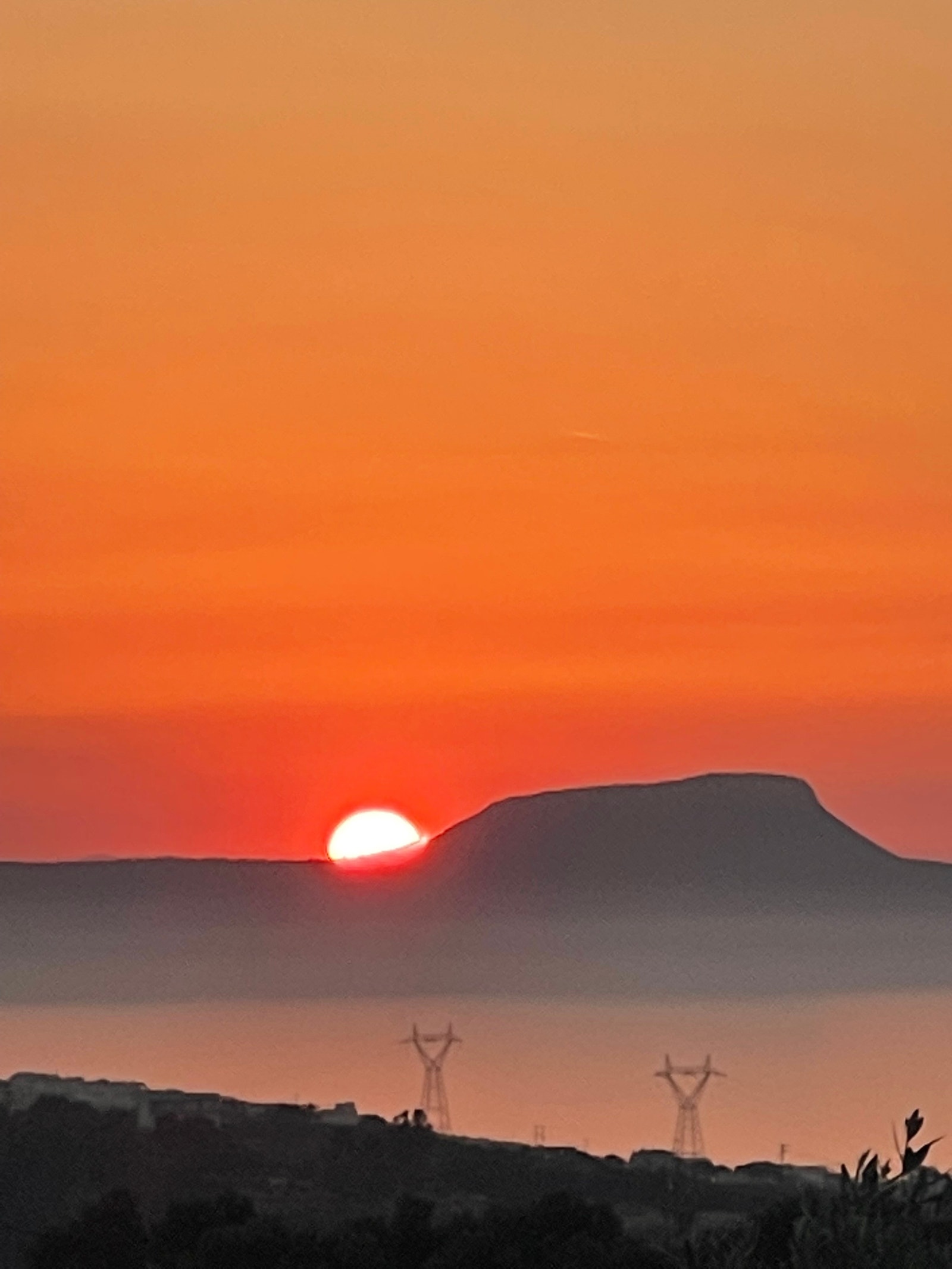 Solnedgang fra huset Galleribilde