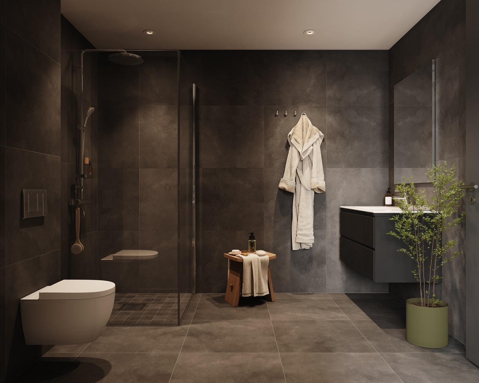 Moderne og delikat helfliset bad. Badet leveres med elegante mørke fliser på 60 cm x 60 cm som dekker både gulv og vegger, mens dusjsonen har mindre mosaikkfliser i samme sofistikerte farge for en harmonisk og stilfull finish. Galleribilde