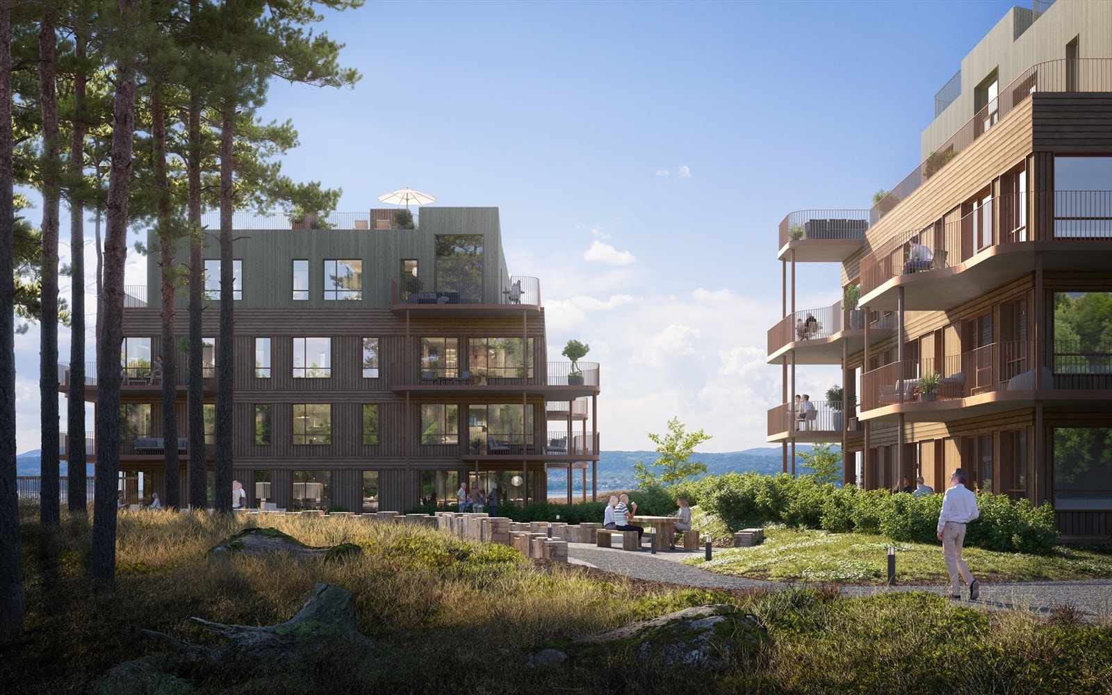 Arkitekturen er inspirert av naturen på området.
Bygningene skal kles i furu og males i naturtoner som
grønt og brunt. De buede balkongene gir bygningene
et organisk og mykt utseende. Galleribilde