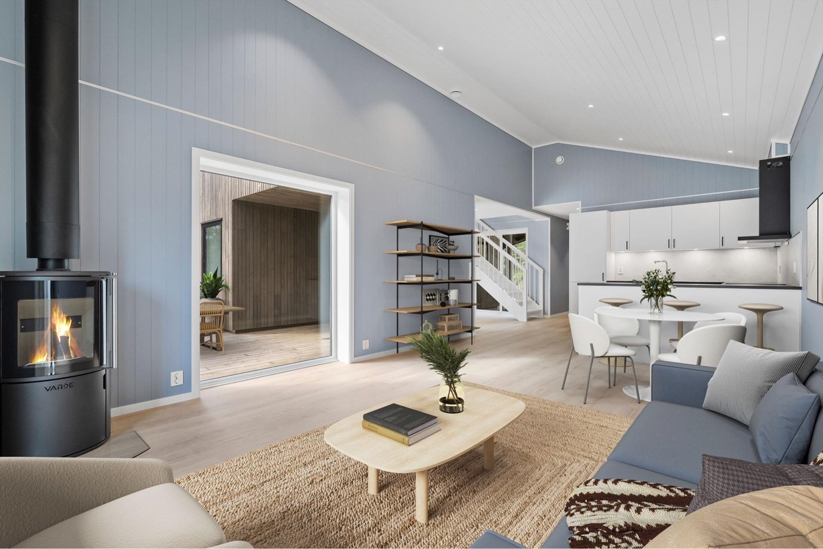 Det er open løysing mellom kjøkken og stove - oppvarming med vedomn og elektriske varmekablar Galleribilde