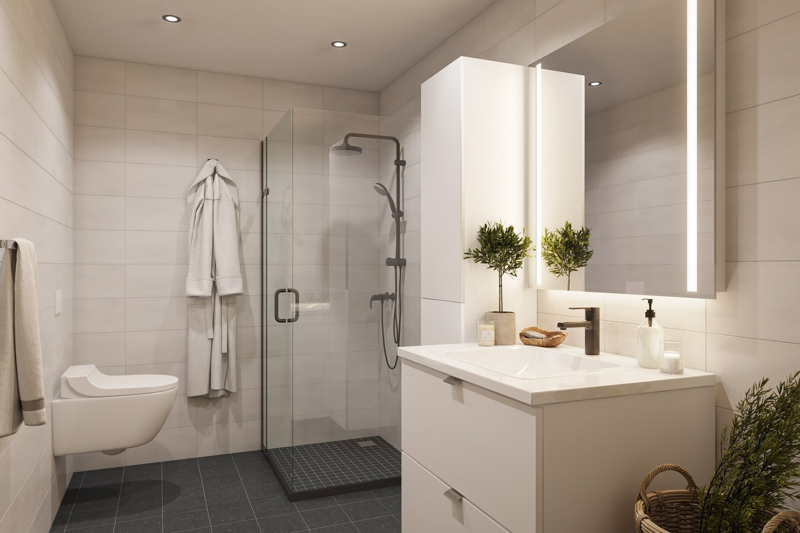 Baderom med fliser på vegger og gulv. 100 cm baderomsinnredning og 40 cm høyskap medfølger. Galleribilde