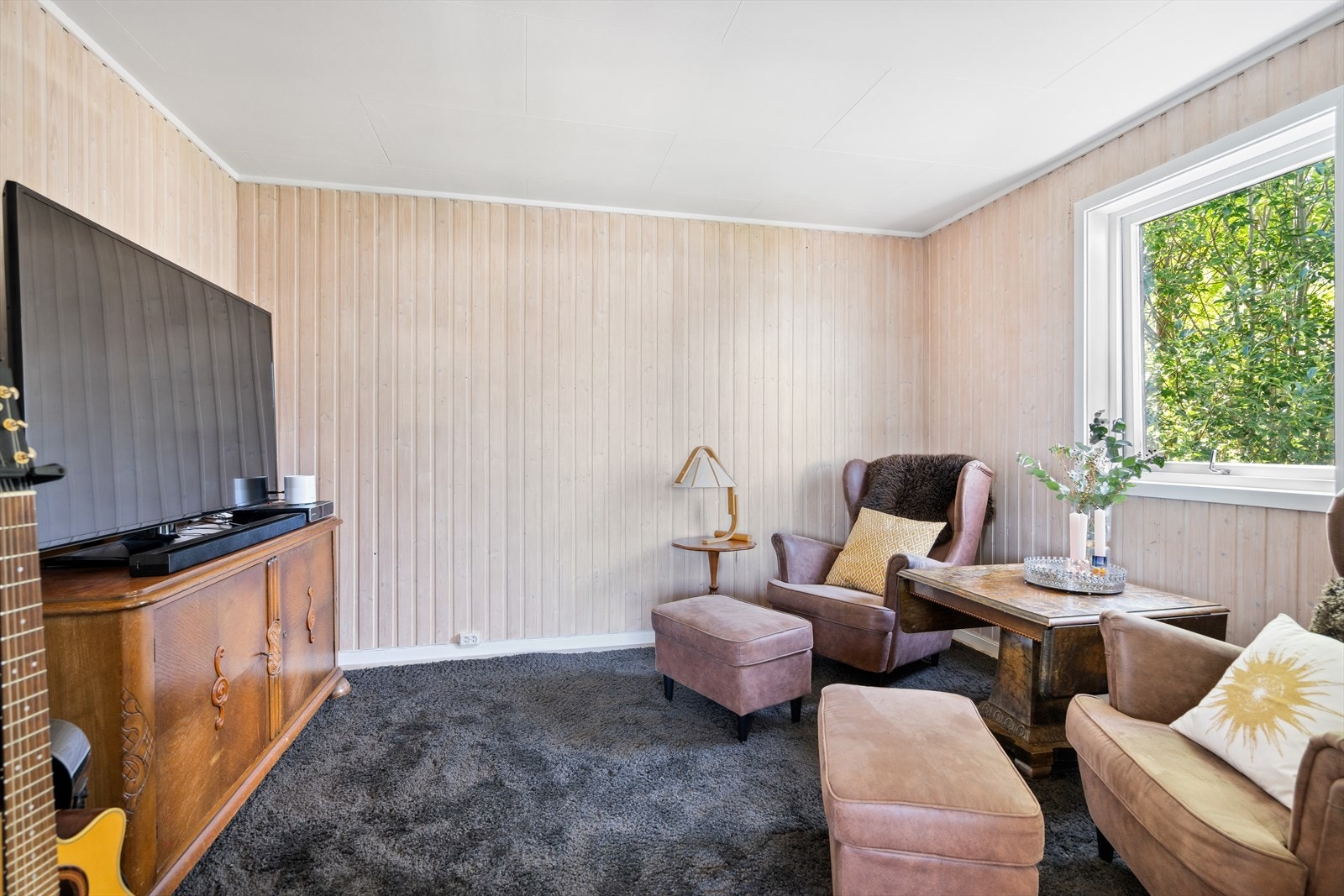 TV-stue innenfor stuen i 3. etasje. Dette er egentlig et 4. soverom. Galleribilde