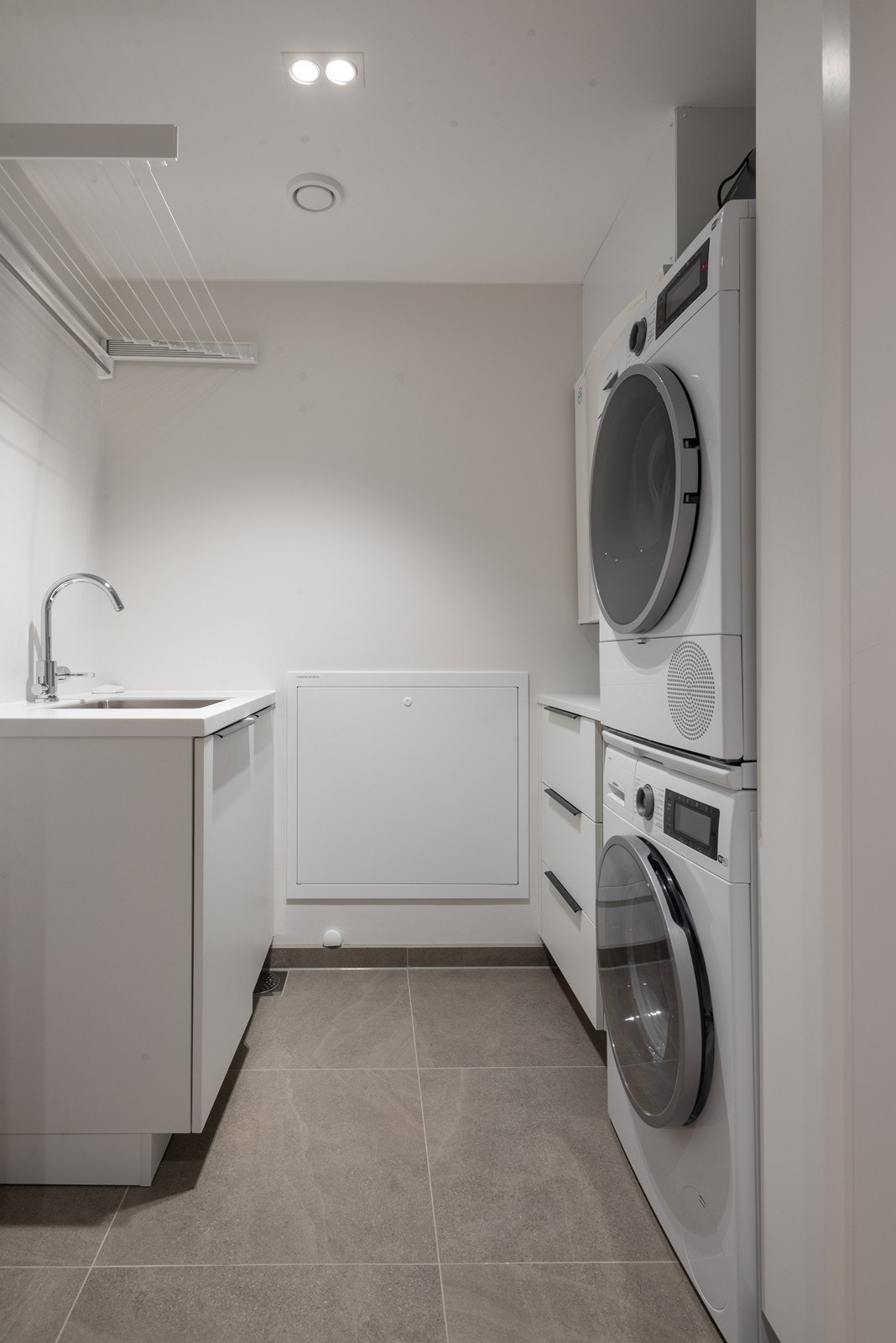 Praktisk vaskerom med direkte inngang fra hallen Galleribilde
