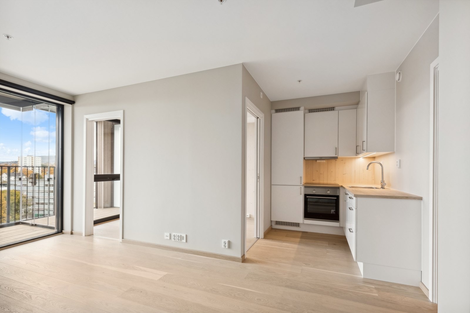 Soverommets utforming tillater lysgjennomgang til kjøkkenet Galleribilde