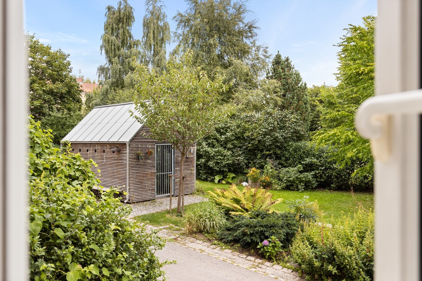Borettslaget har låsbart sykkelskur i bakgården som kan benyttes av beboerne Galleribilde