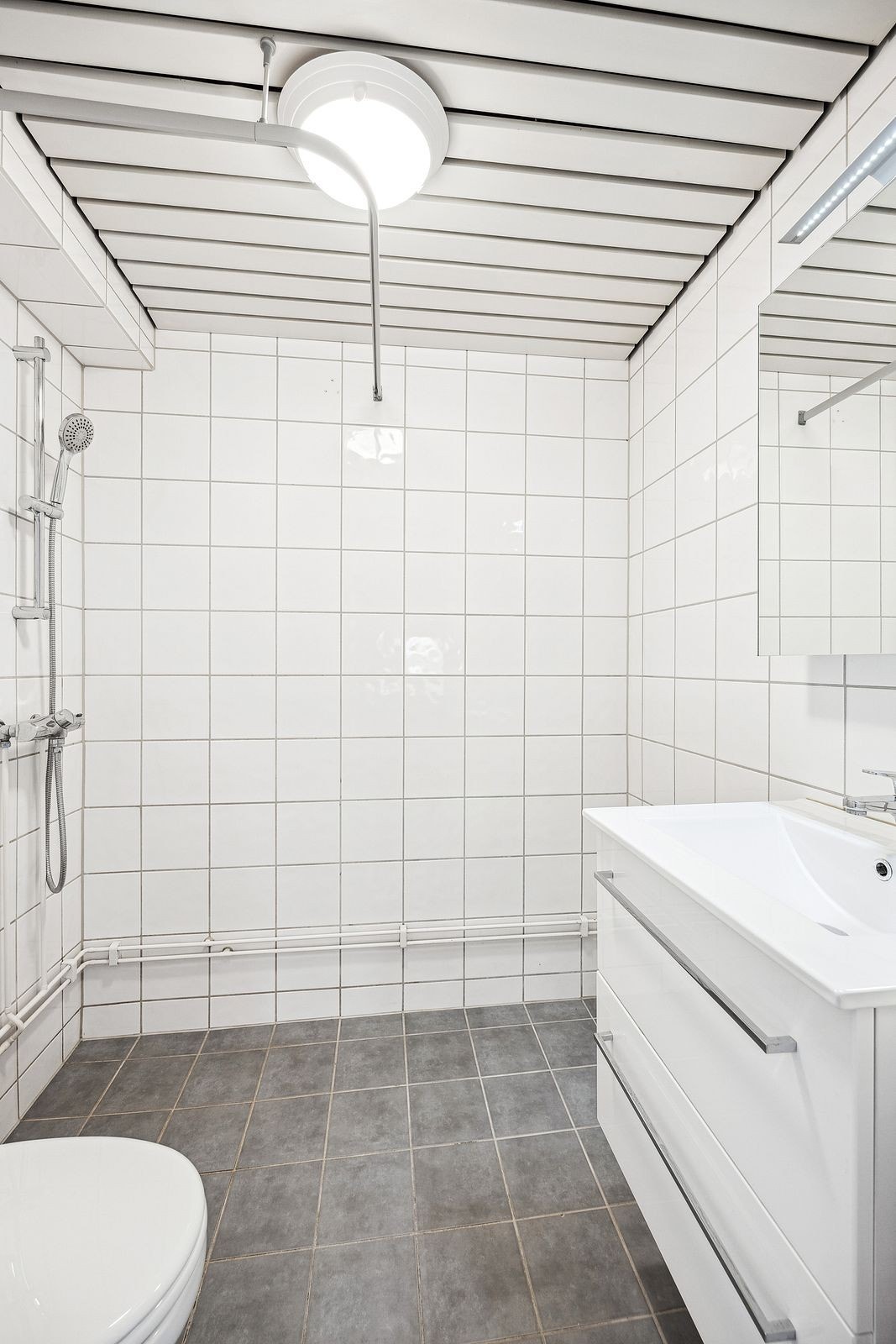 Flislagt bad med gulvvarme. Galleribilde