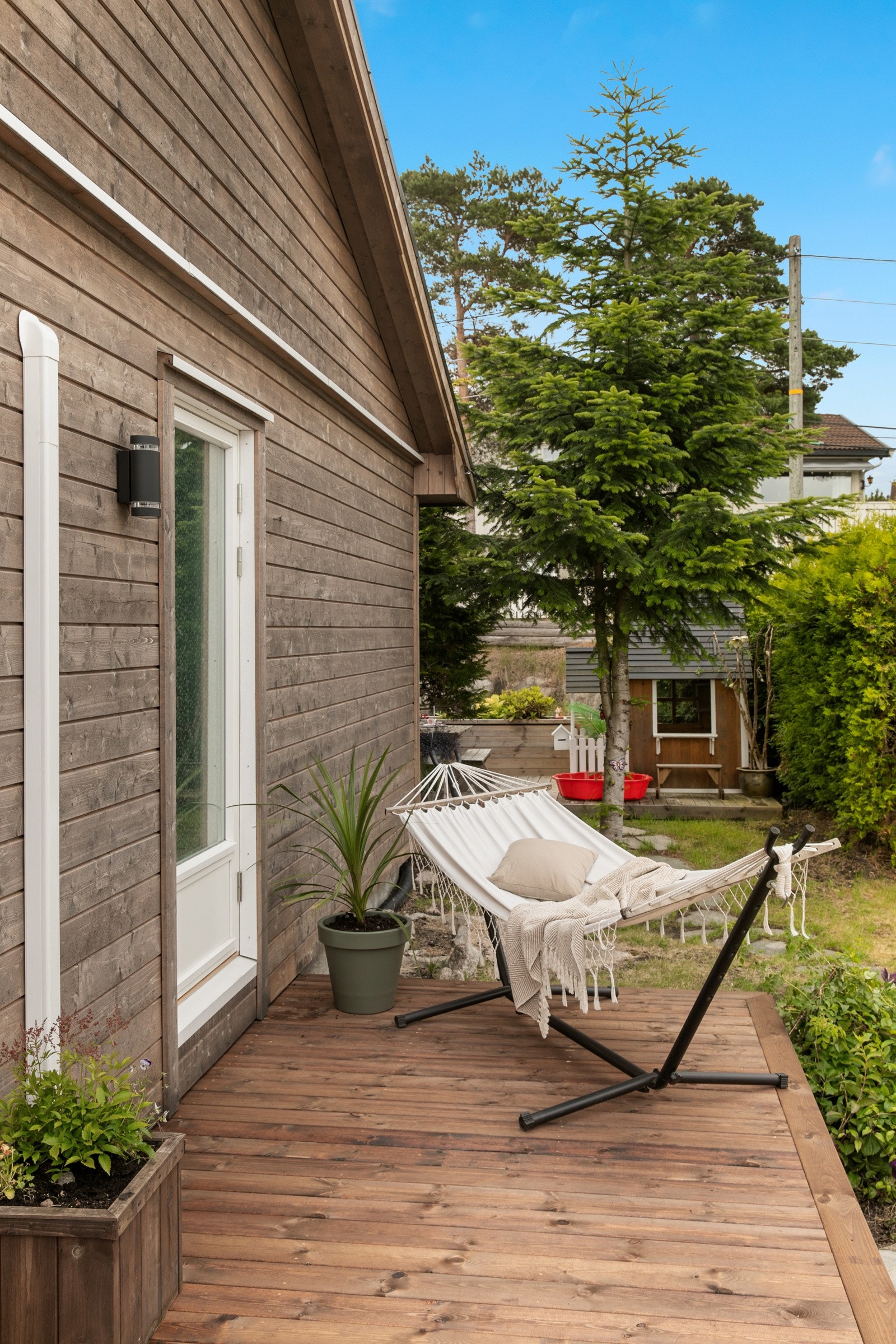 På denne siden er det inngang til stuen Galleribilde