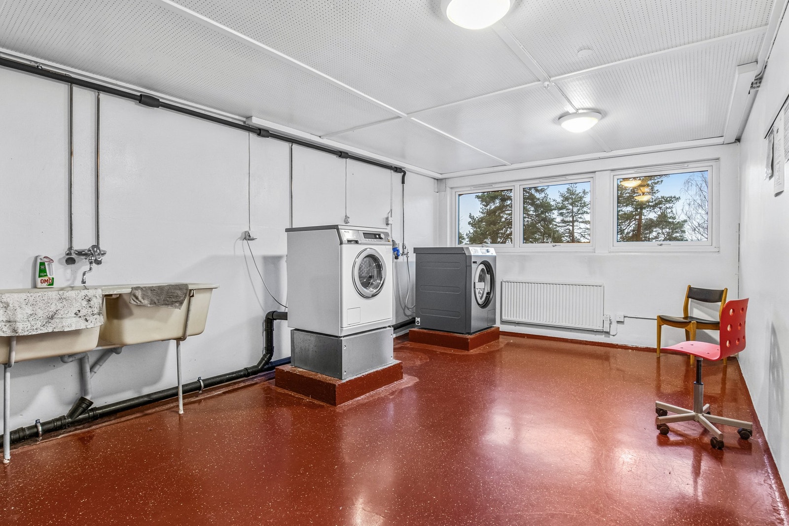 Gratis vaskeri med tilkomst fra underetasjen i blokken Galleribilde