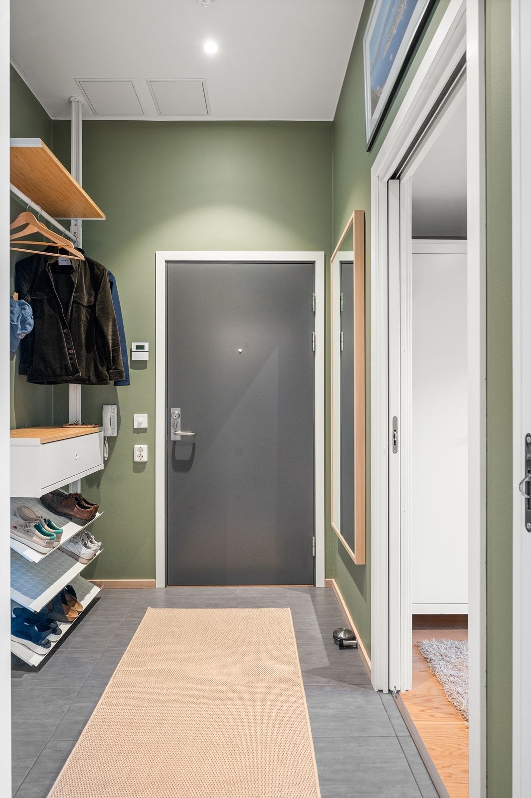 Det første som møter deg er en lun og innbydende entré Galleribilde