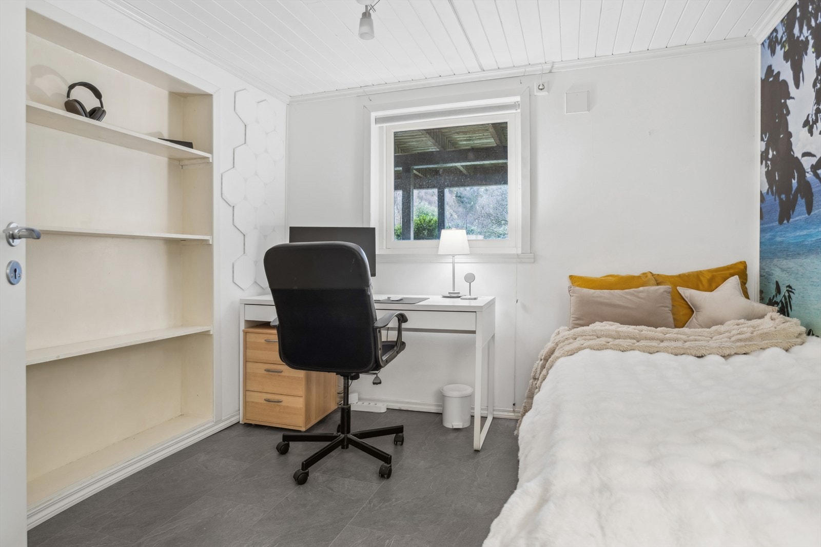 Innredet rom i underetasjen som benyttes som soverom. Galleribilde