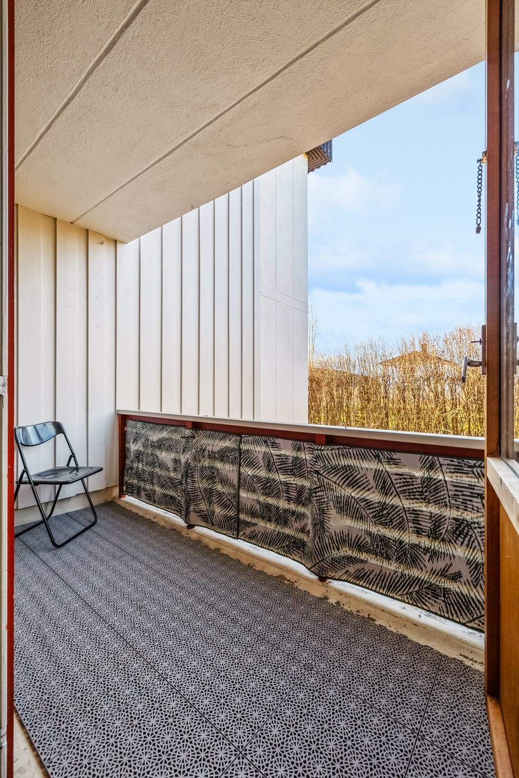 Overbygget balkong med adkomst ut fra stuen. Galleribilde