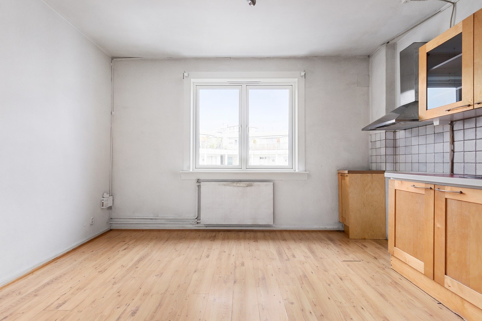 En arealsmart 1-roms med stort potensiale for å skape din drømmebolig! Galleribilde