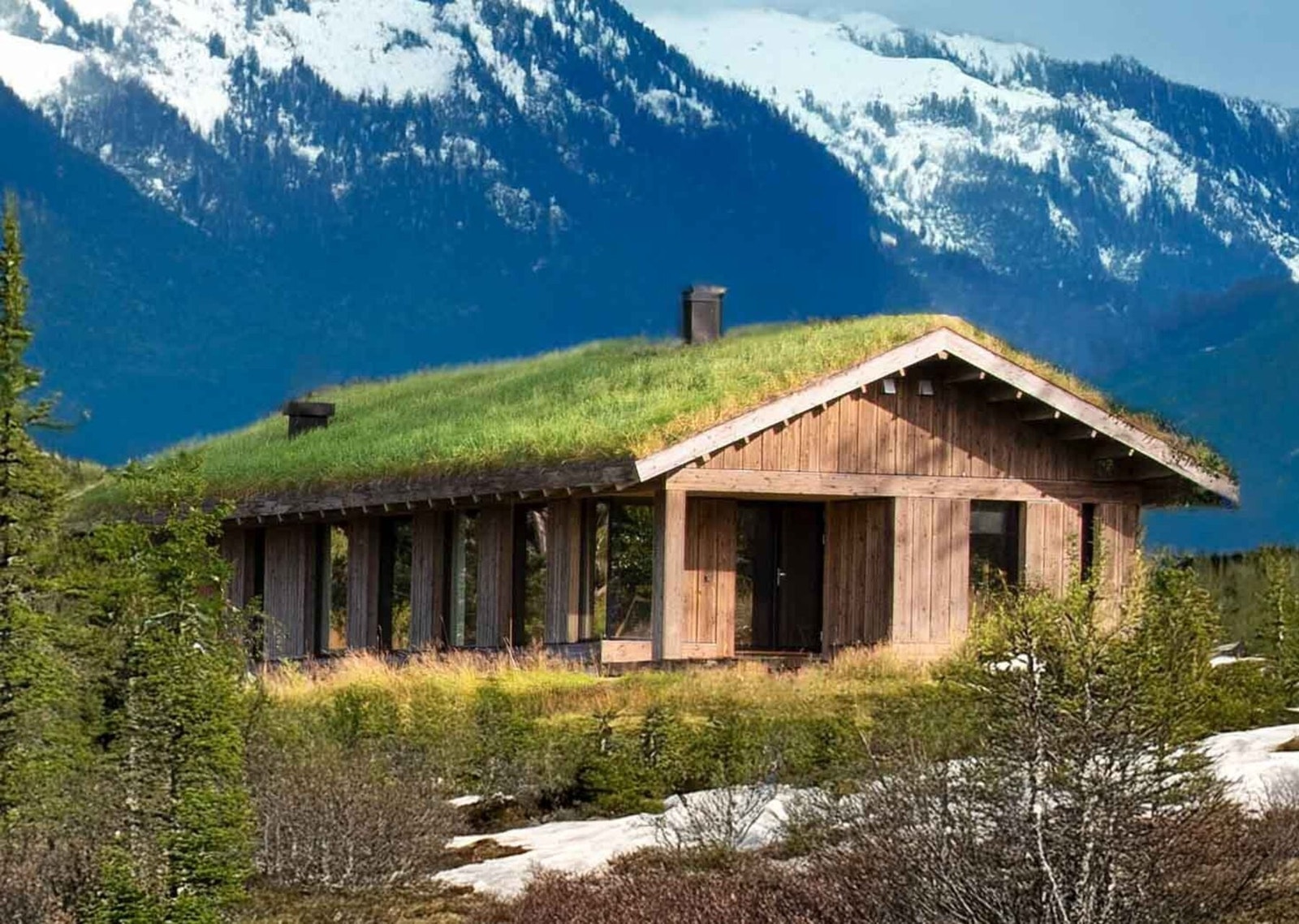 Hyttemodell Vy standard glir godt inn i landskapet. Her et redigert foto fra en oppsatt modell. Galleribilde