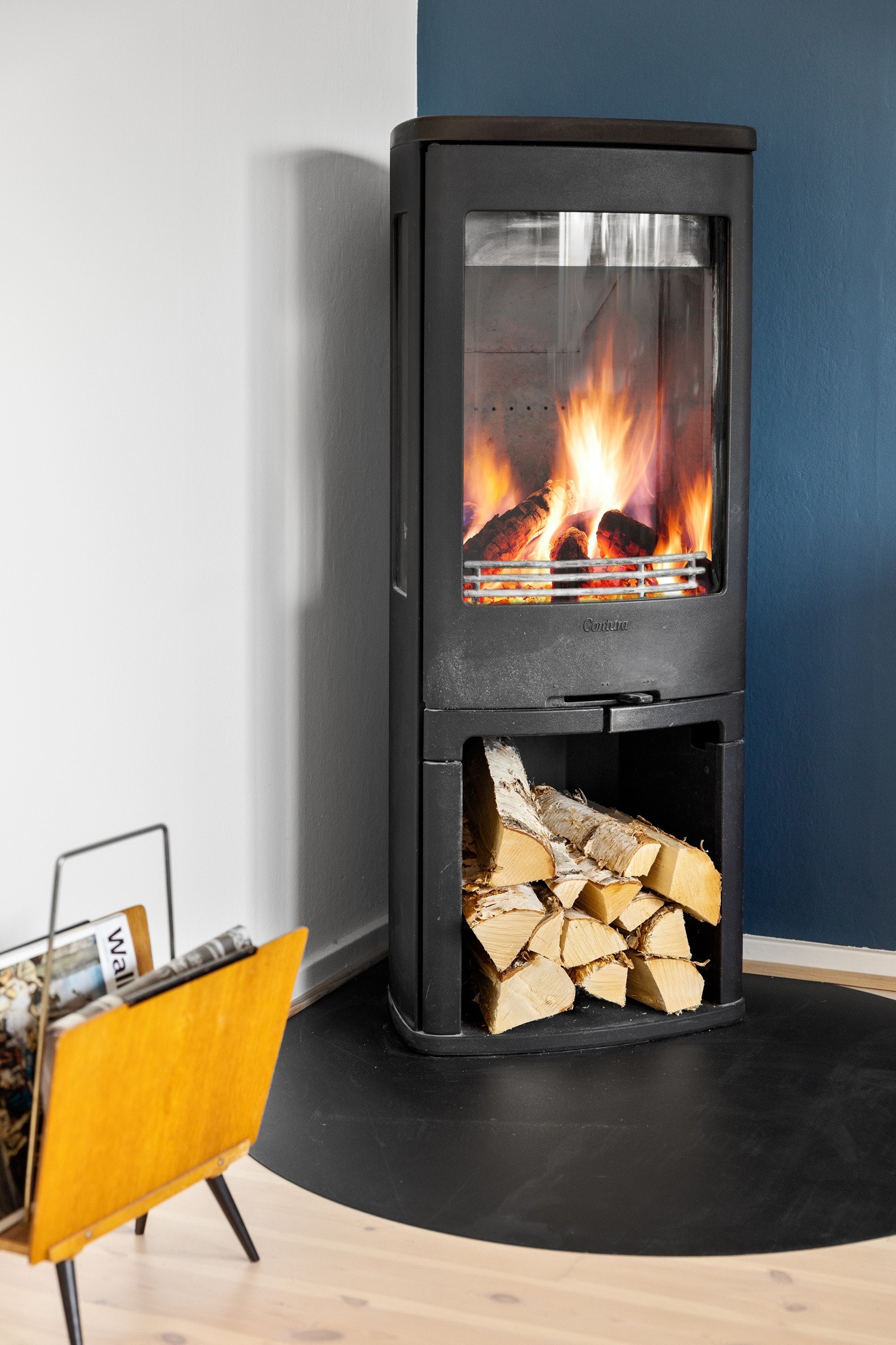 Leiligheten har også en moderne vedovn. Perfekt for kalde høst- og vinterkvelder. Galleribilde