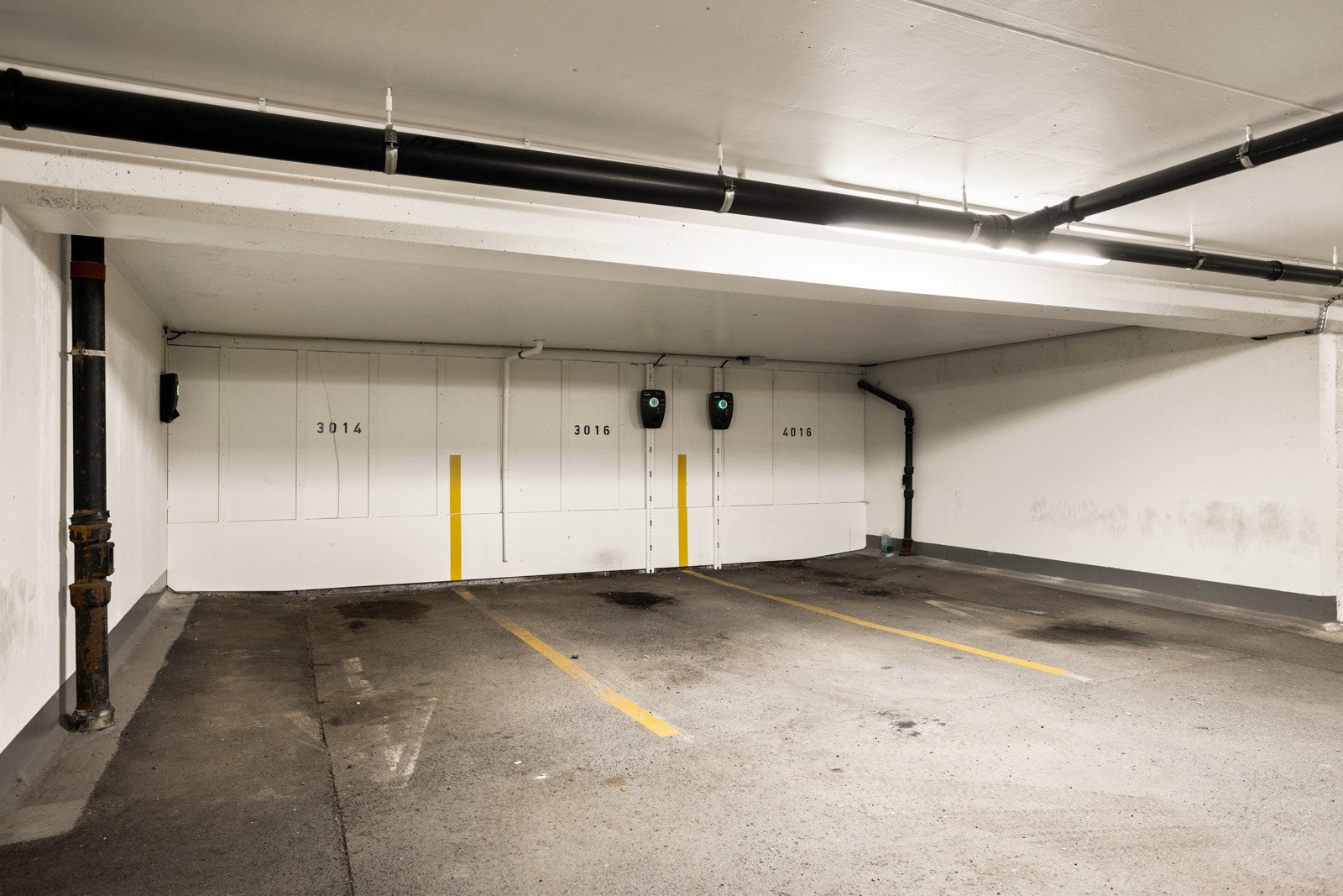 Leiligheten disponerer en egen garasjeplass i felles parkeringskjeller Galleribilde
