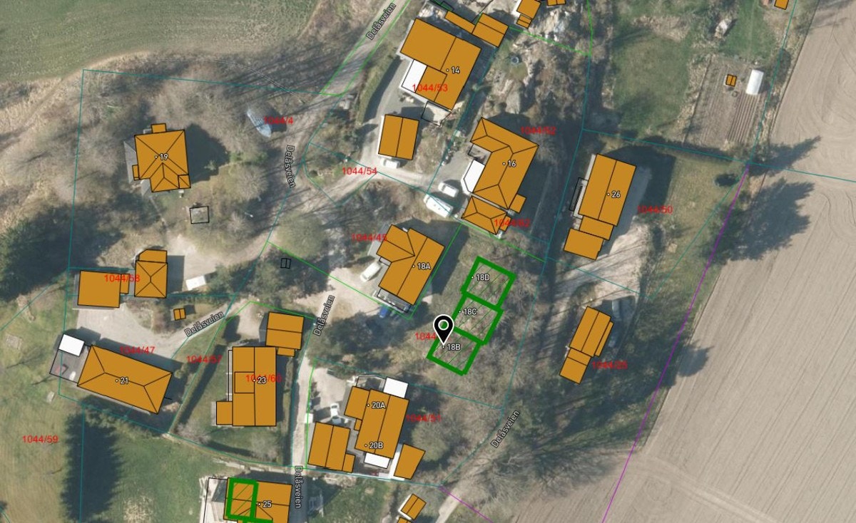 Den planlagt bebyggelsen er market med grønt Galleribilde