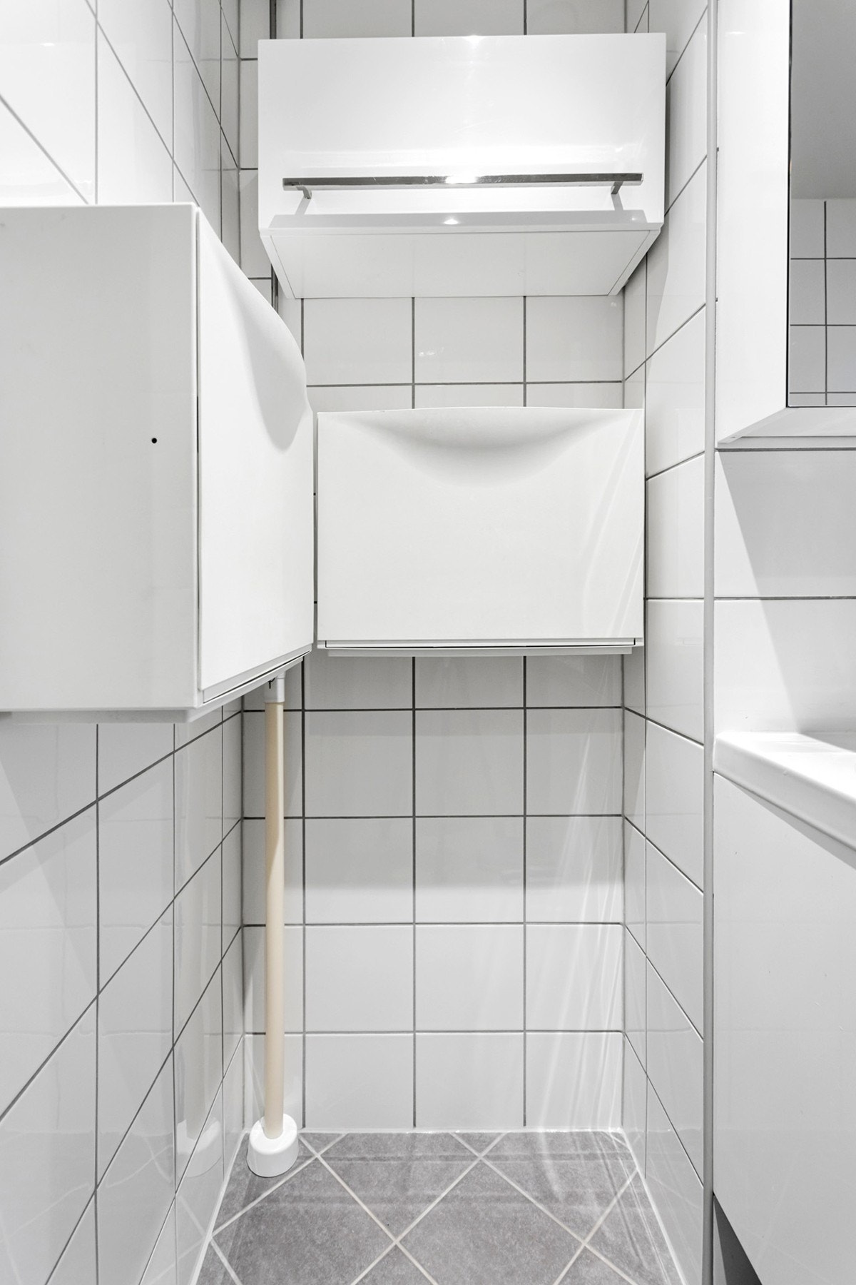Badet har opplegg for vaskemaskin. Galleribilde