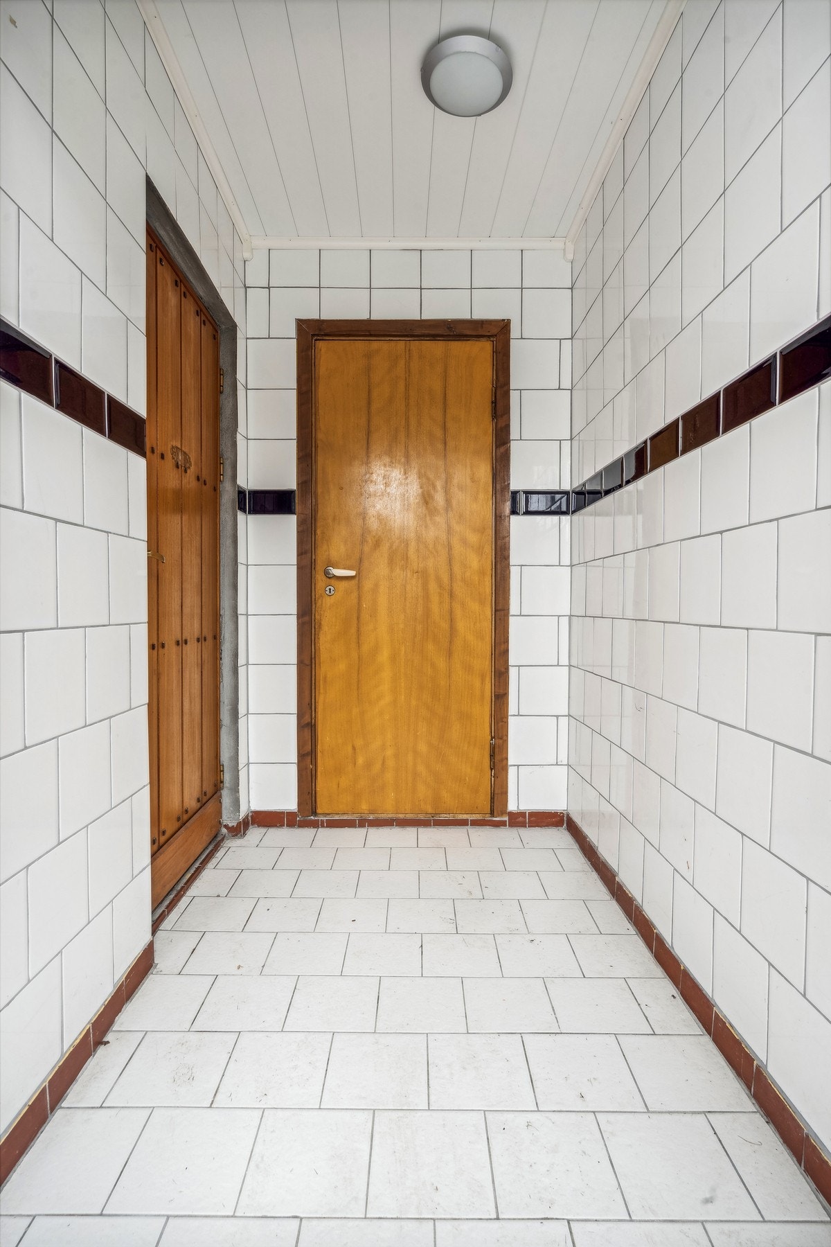 1. etasje har BRA-i 59 m² og inneholder vindfang, bod, allrom med trapp, vaskerom, 2 soverom, bad Galleribilde