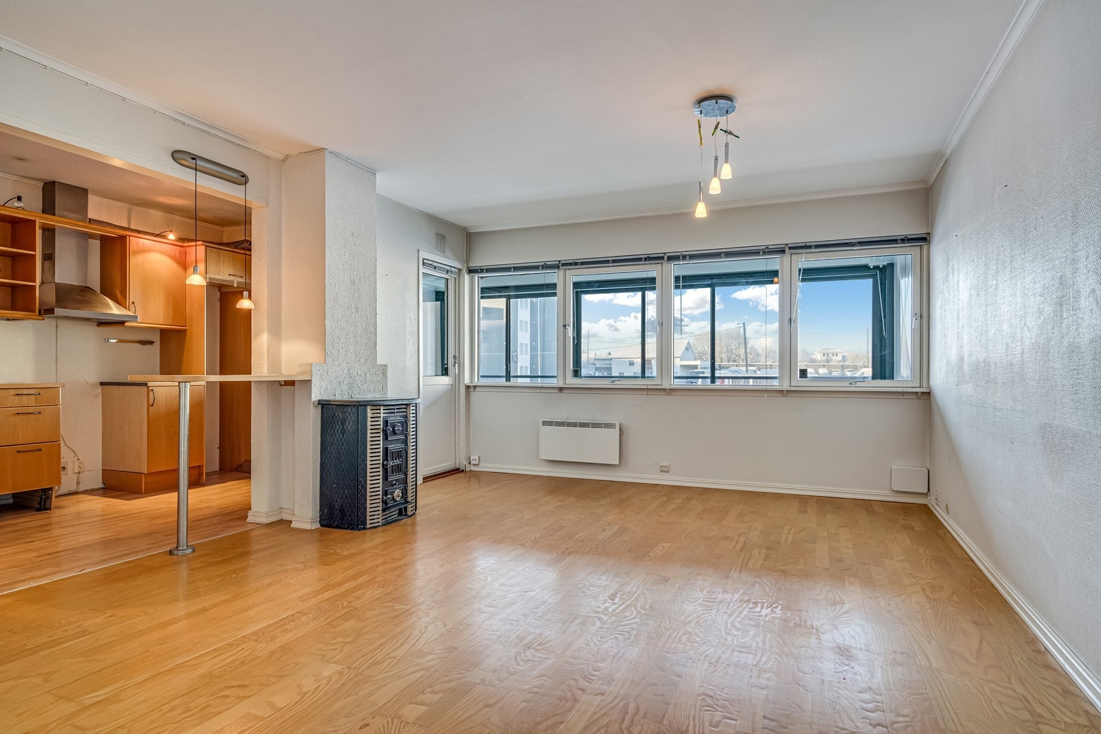 Stue med vedovn Galleribilde