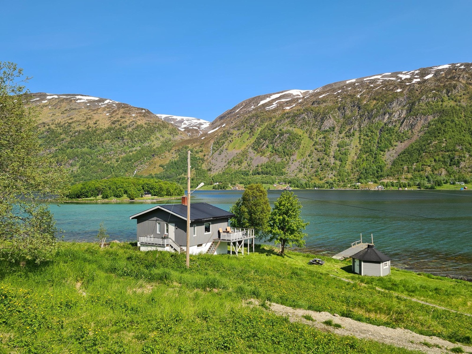 10 mål tomt og ca 130 meter med strandlinje Galleribilde