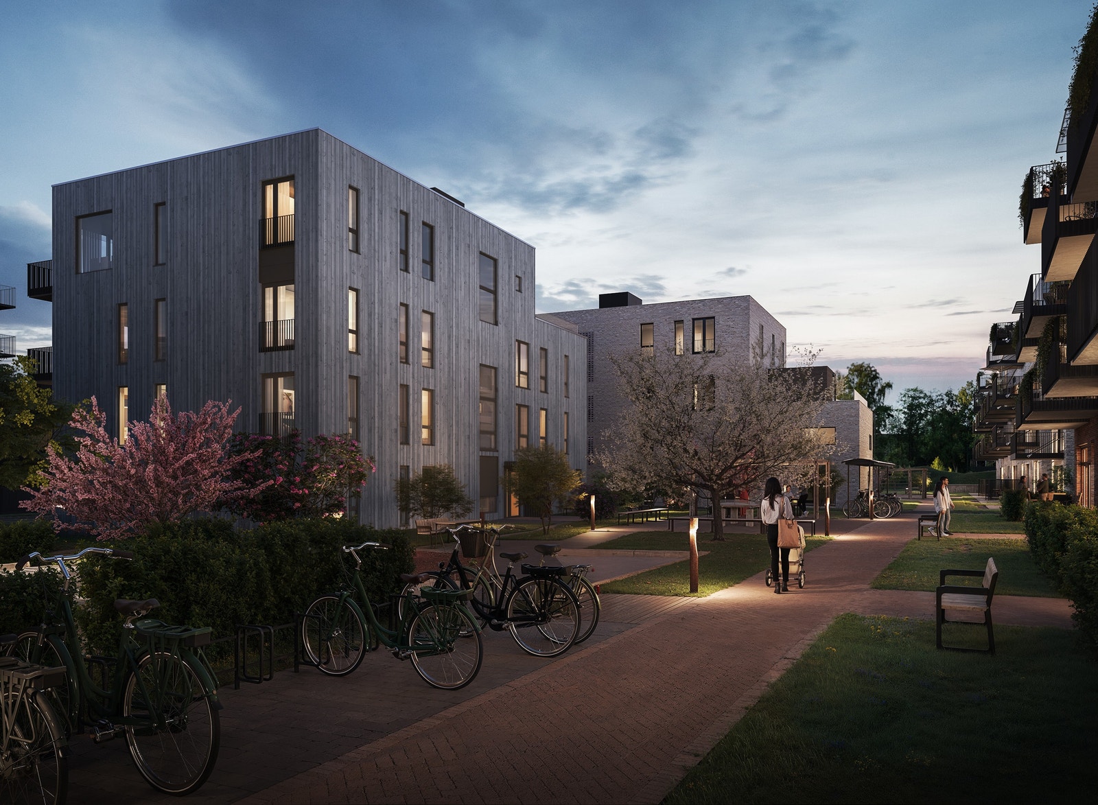 Fasadene er hovedsakelig i tegl, men med variasjon av panel av malmfuru på et av byggene Galleribilde