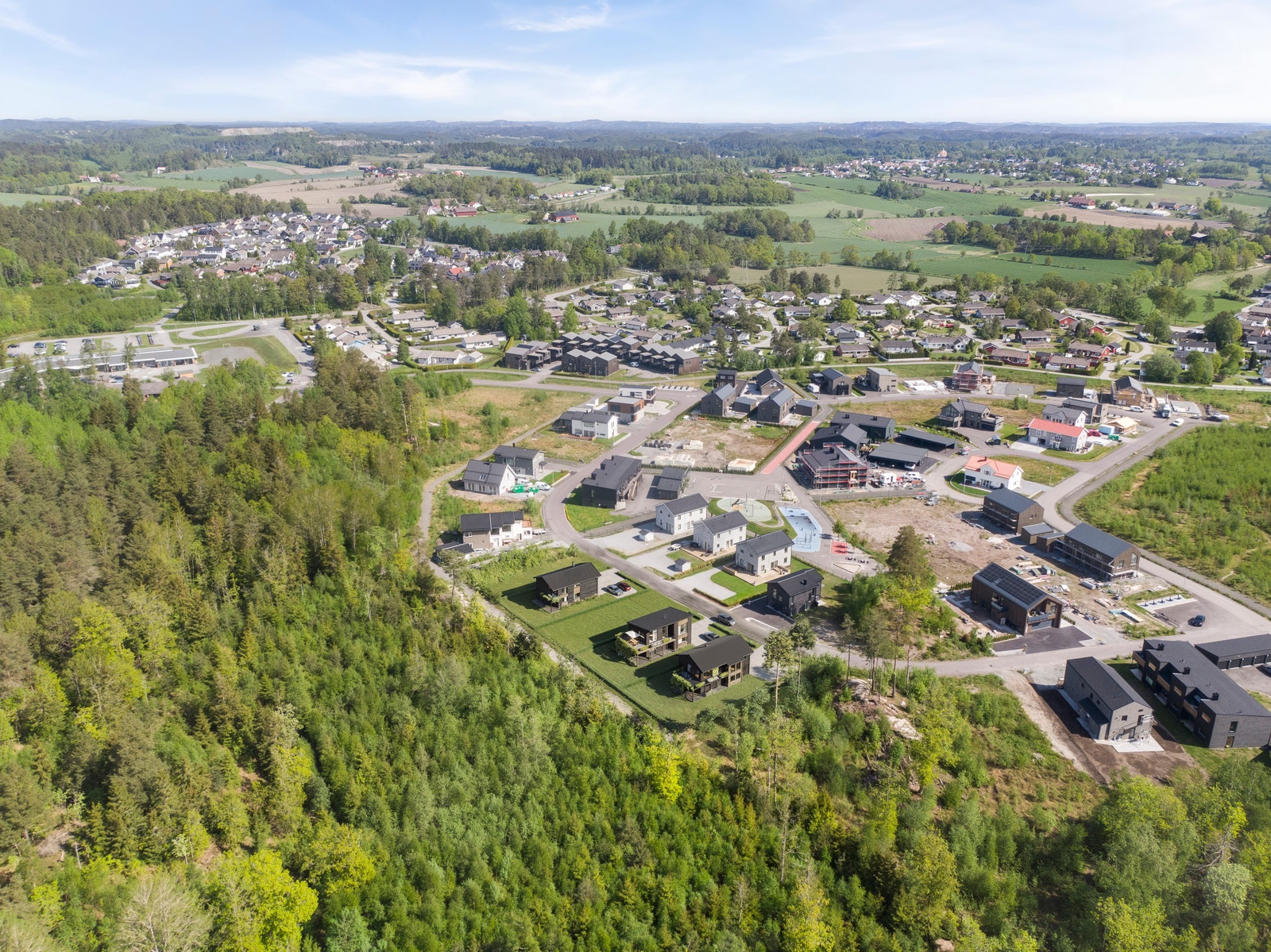 Husene vi skal bygge vist på tomtene Galleribilde