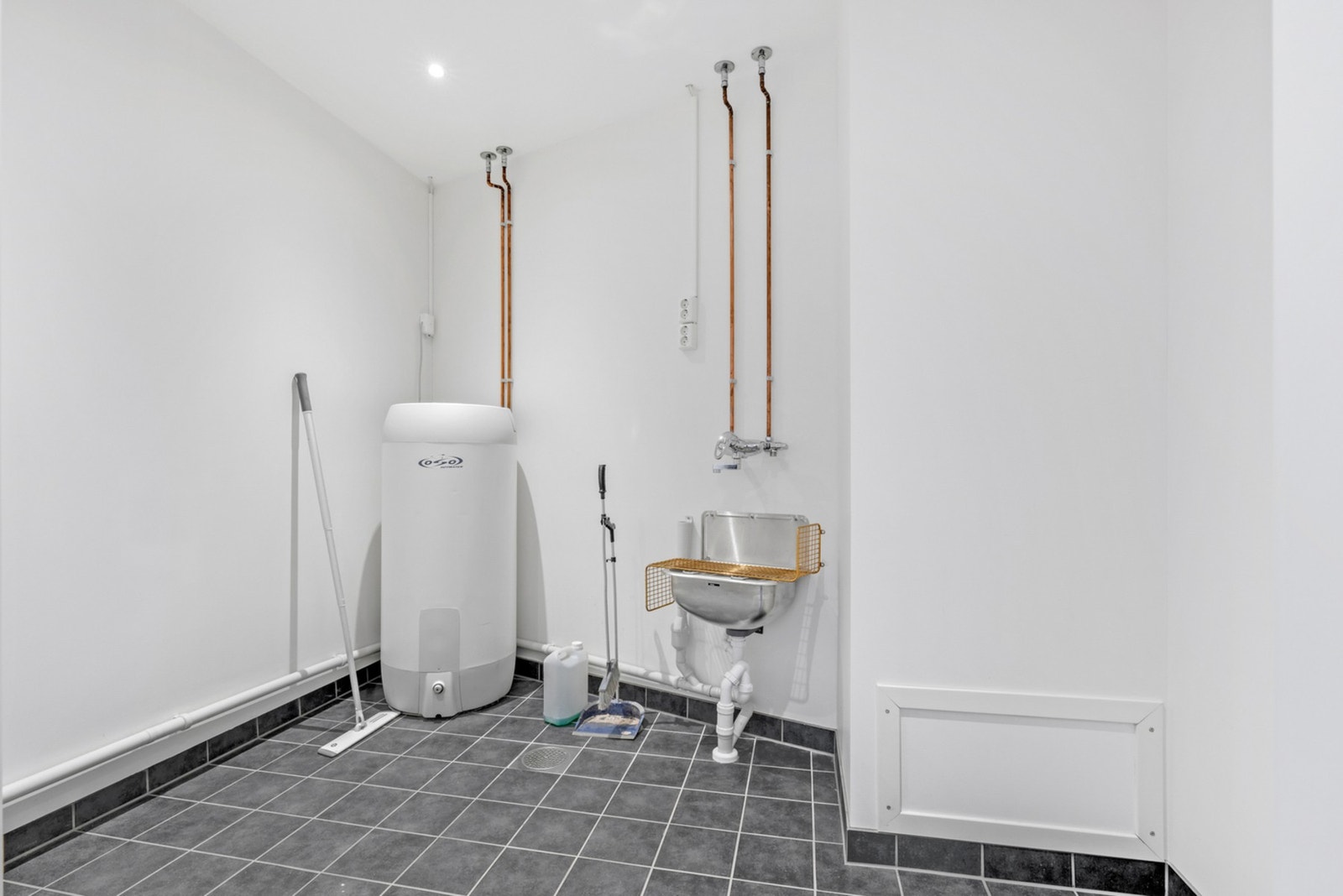 Leiligheten har eget vaskerom med inngang fra badet. Galleribilde