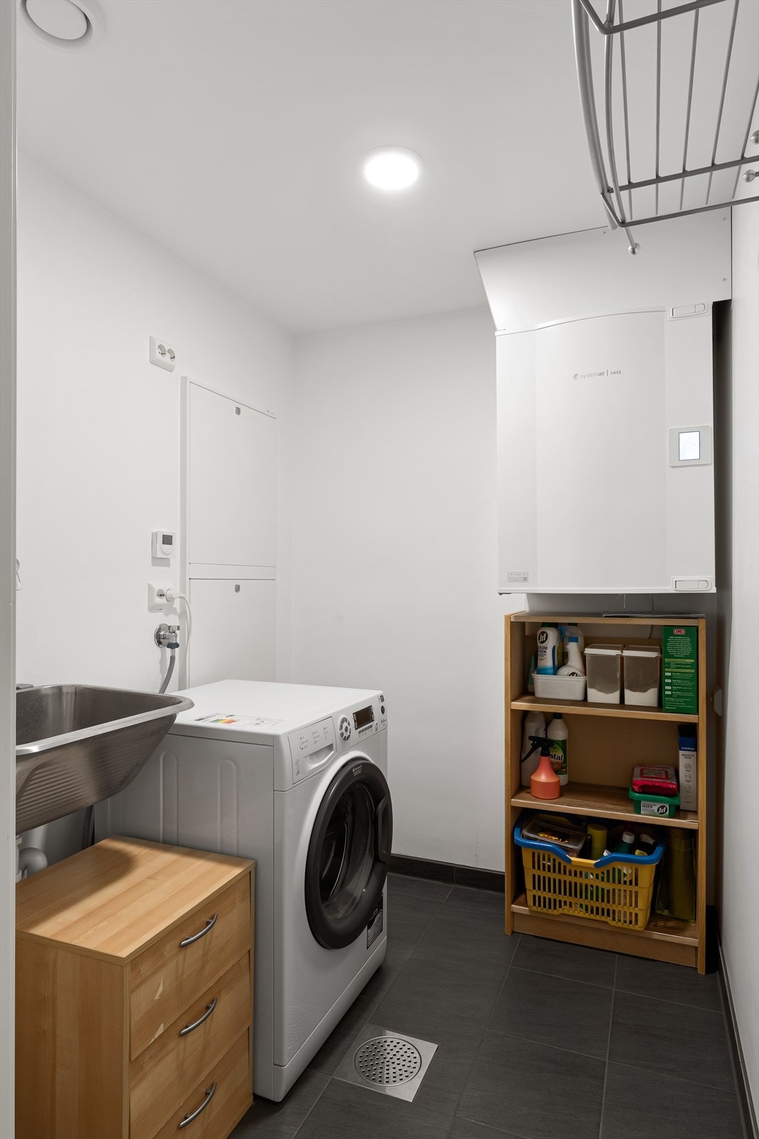 Leiligheten har hele 2 bad og et eget vaskerom. Galleribilde