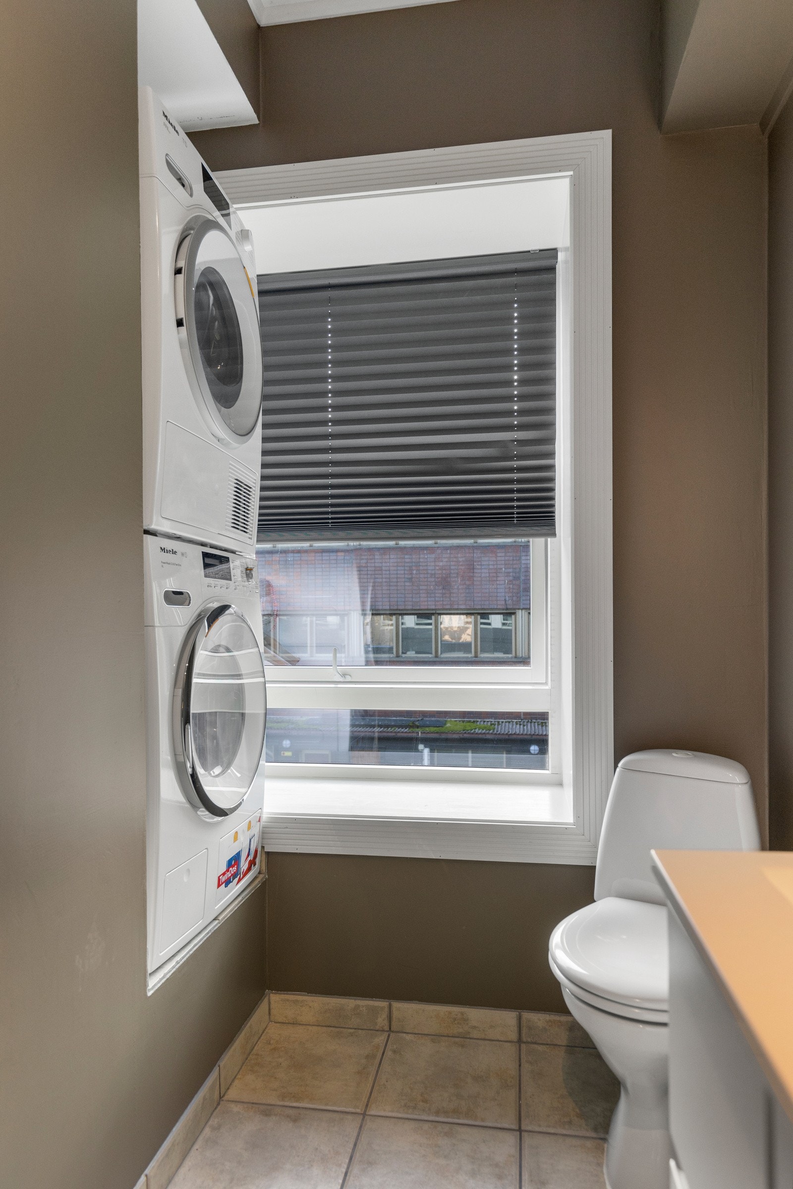 I tilknytning til gangen finner vi boligens vaskerom. Galleribilde