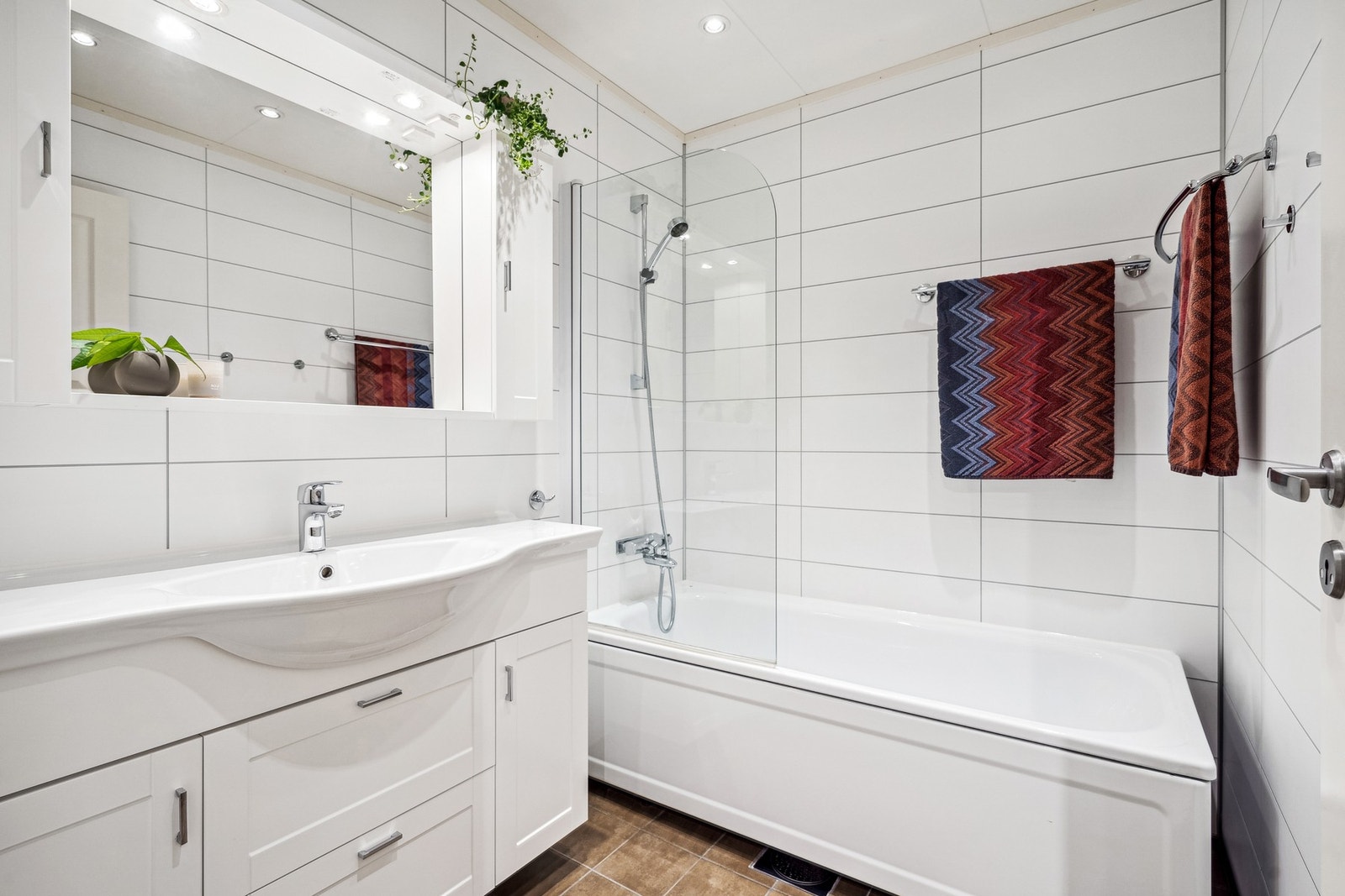 Flislagt bad med gulvvarme Galleribilde