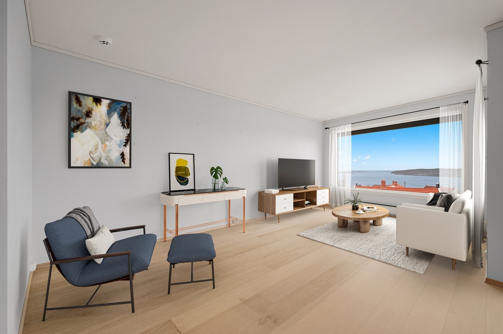 Åpen løsning mellom stue og kjøkken som gir en god romfølelse. (Digital styling) Galleribilde
