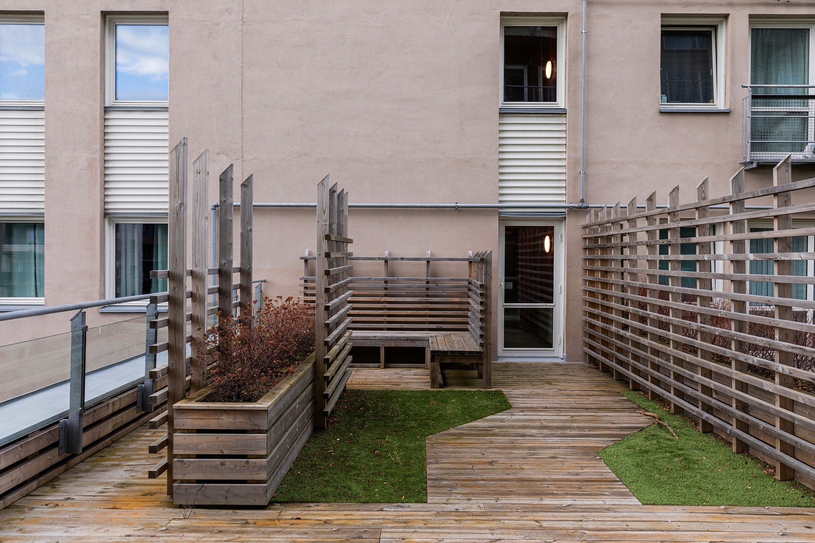 Felles takterrasse som er tilgjengelig for beboerne i bygget. Galleribilde